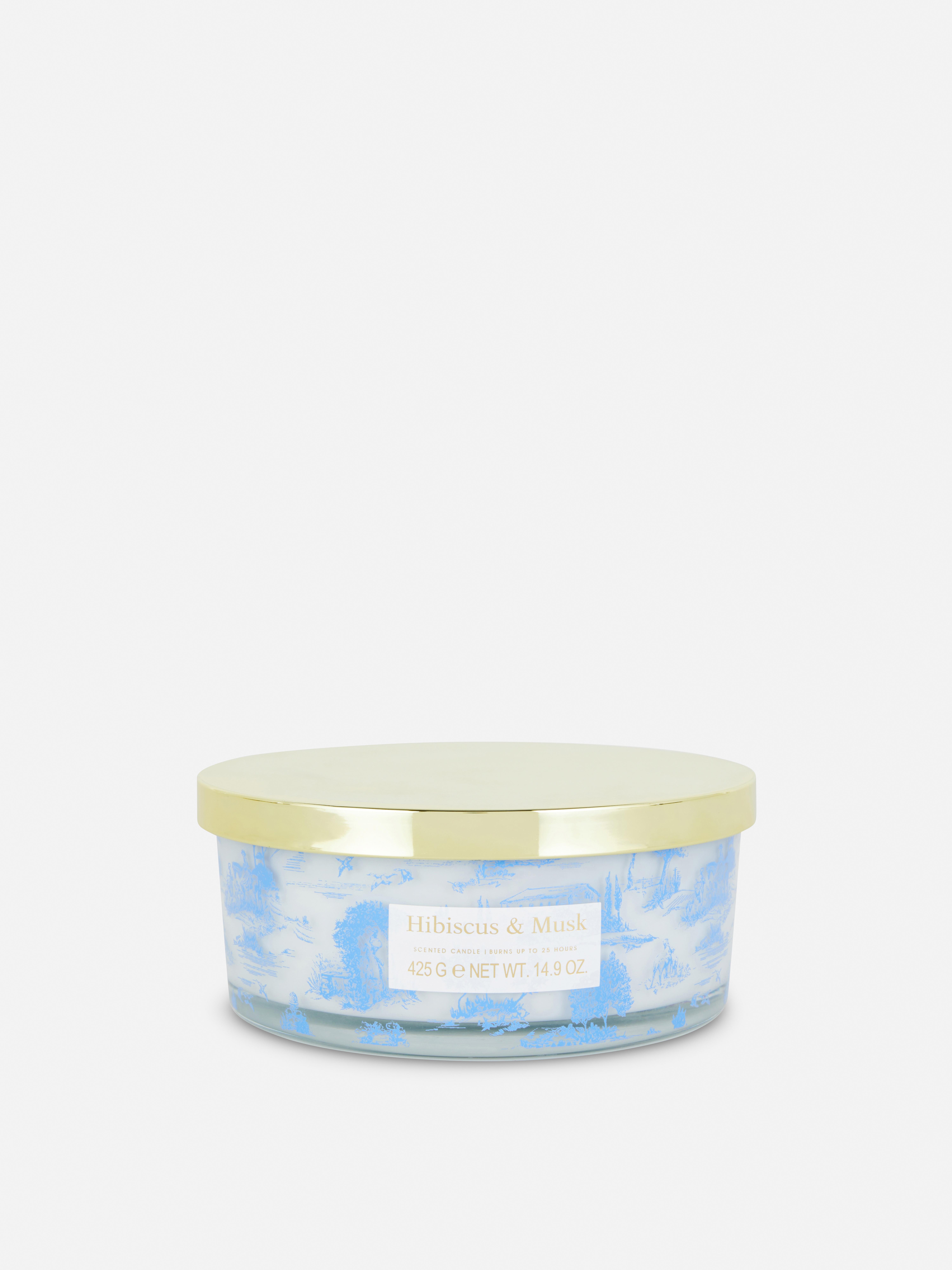 Bougie parfumée à trois mèches dans un pot automnal Bleu