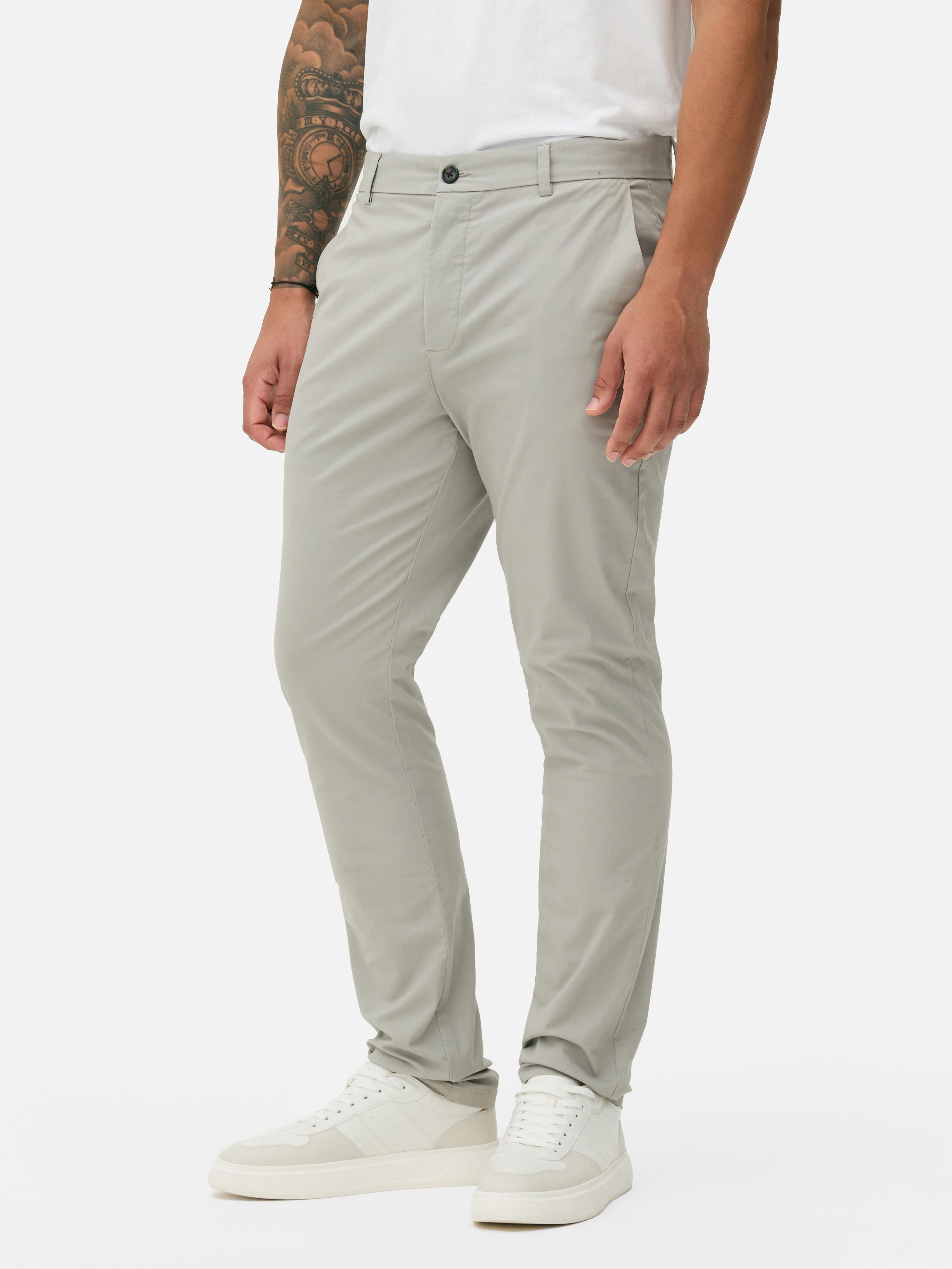 Pantalones chinos elasticos de corte entallado Gris claro Hombre Primark