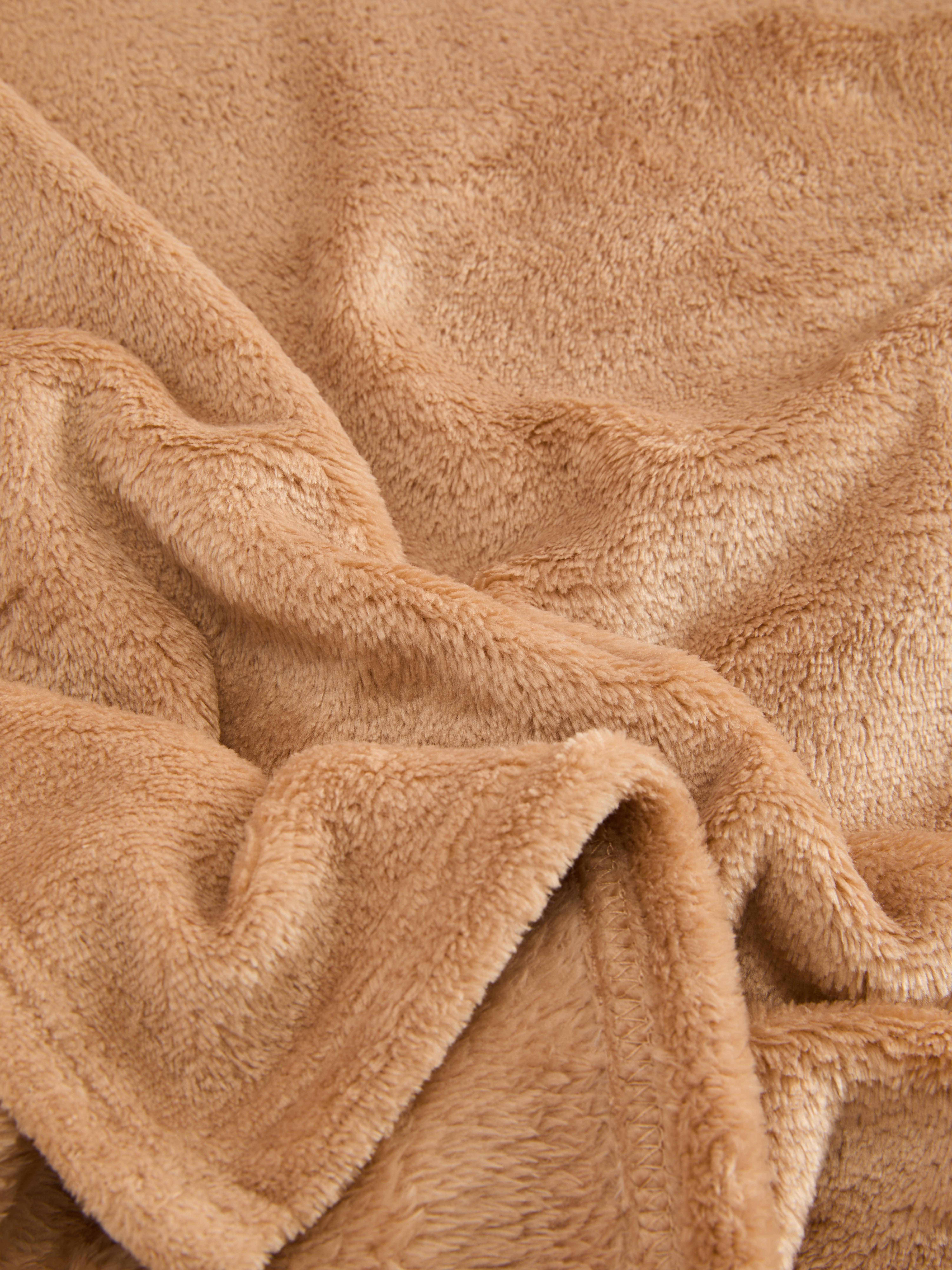 Petite couverture duveteuse ultra-douce