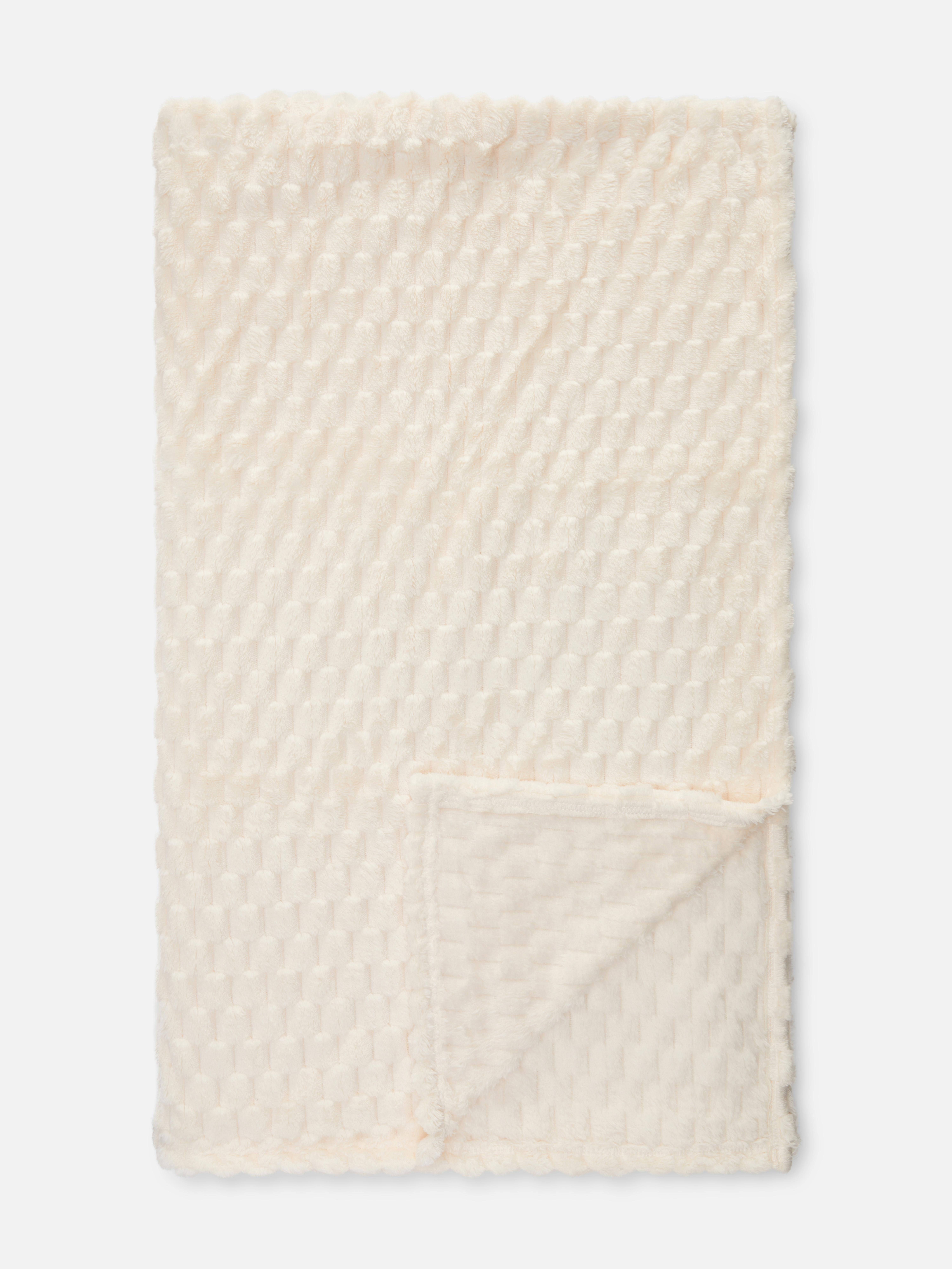 Manta extrasuave con textura de nido de abeja