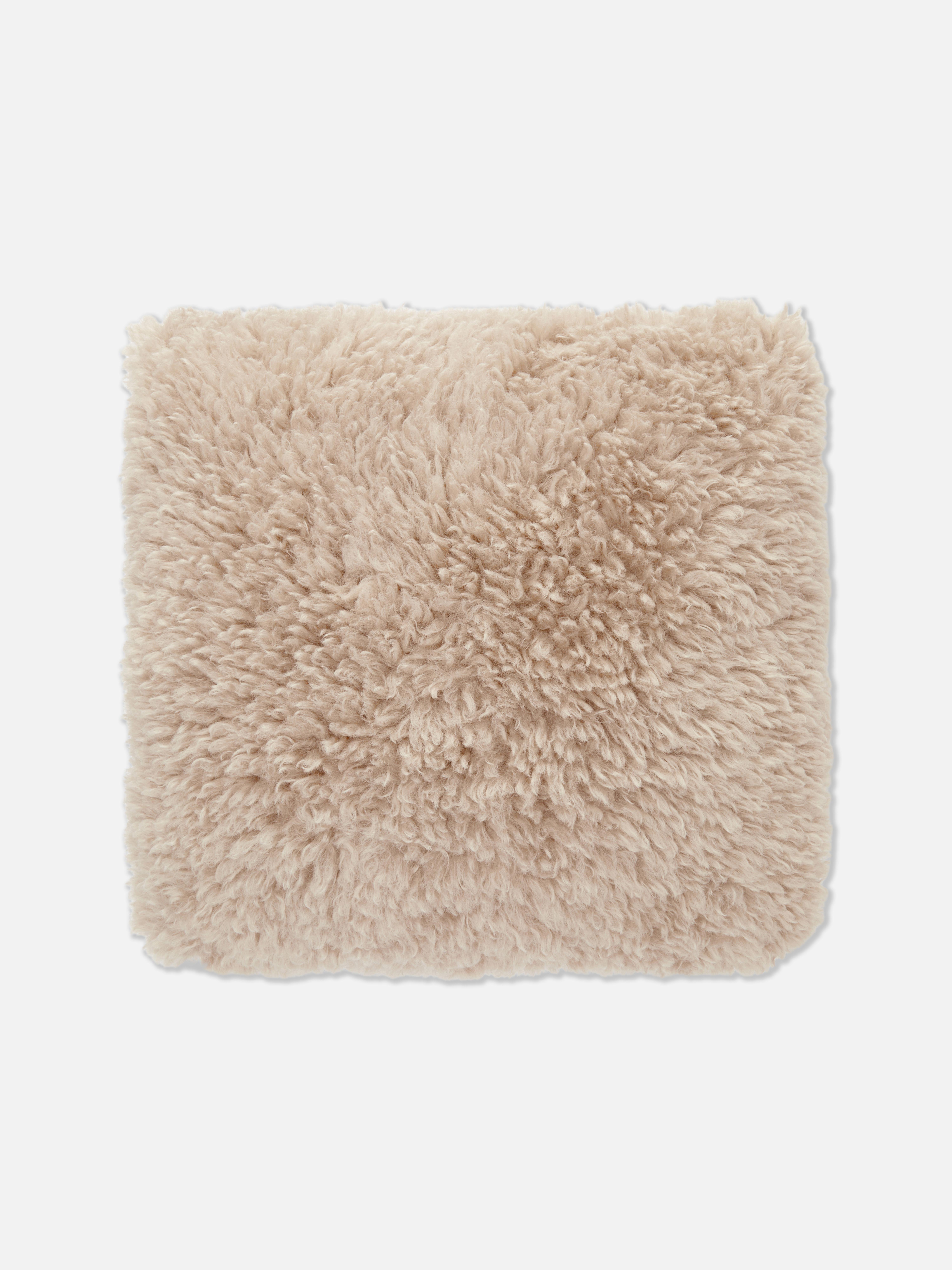 Pink fluffy cushions primark best sale