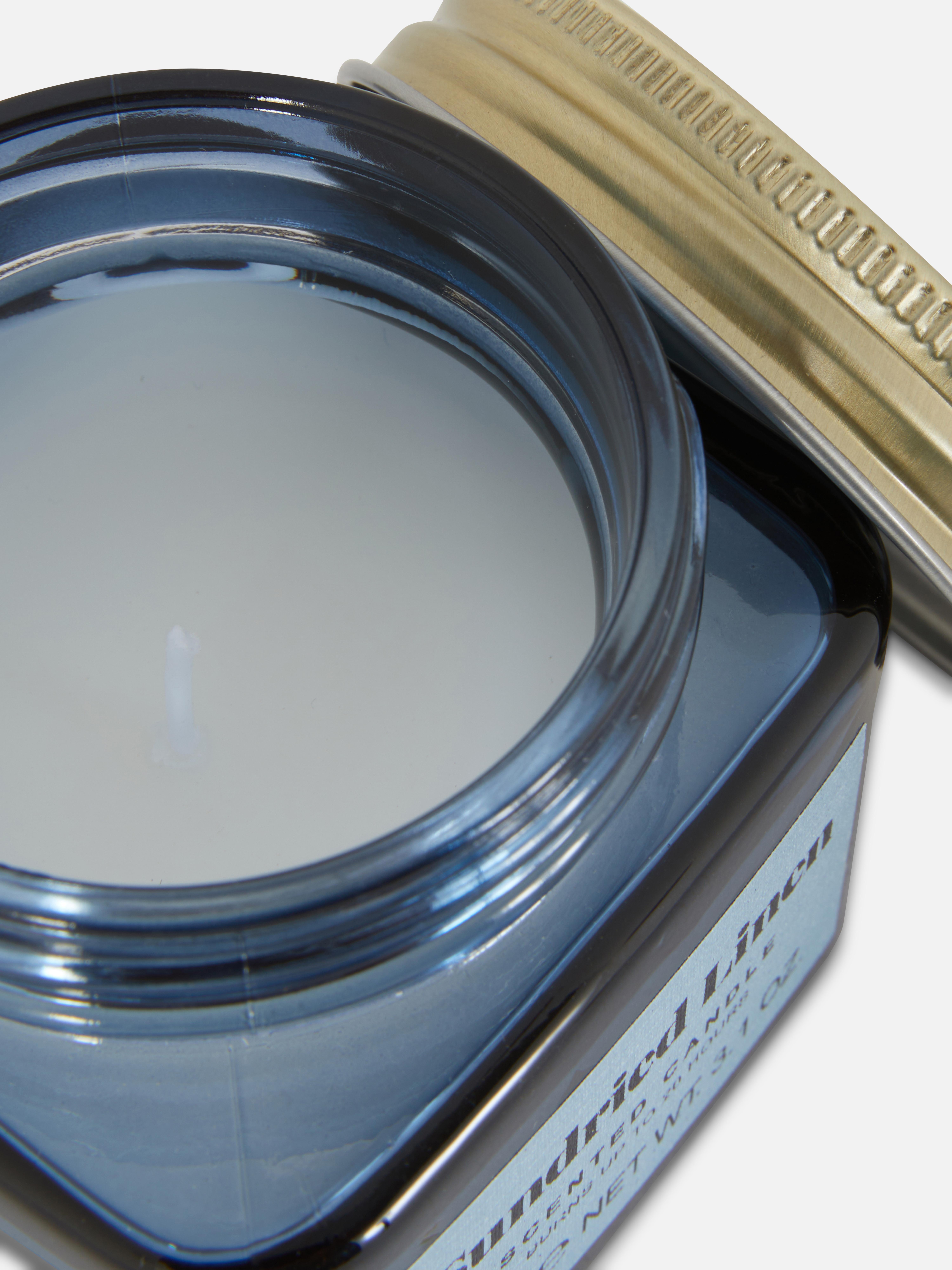 Bougie parfumée dans un pot en verre