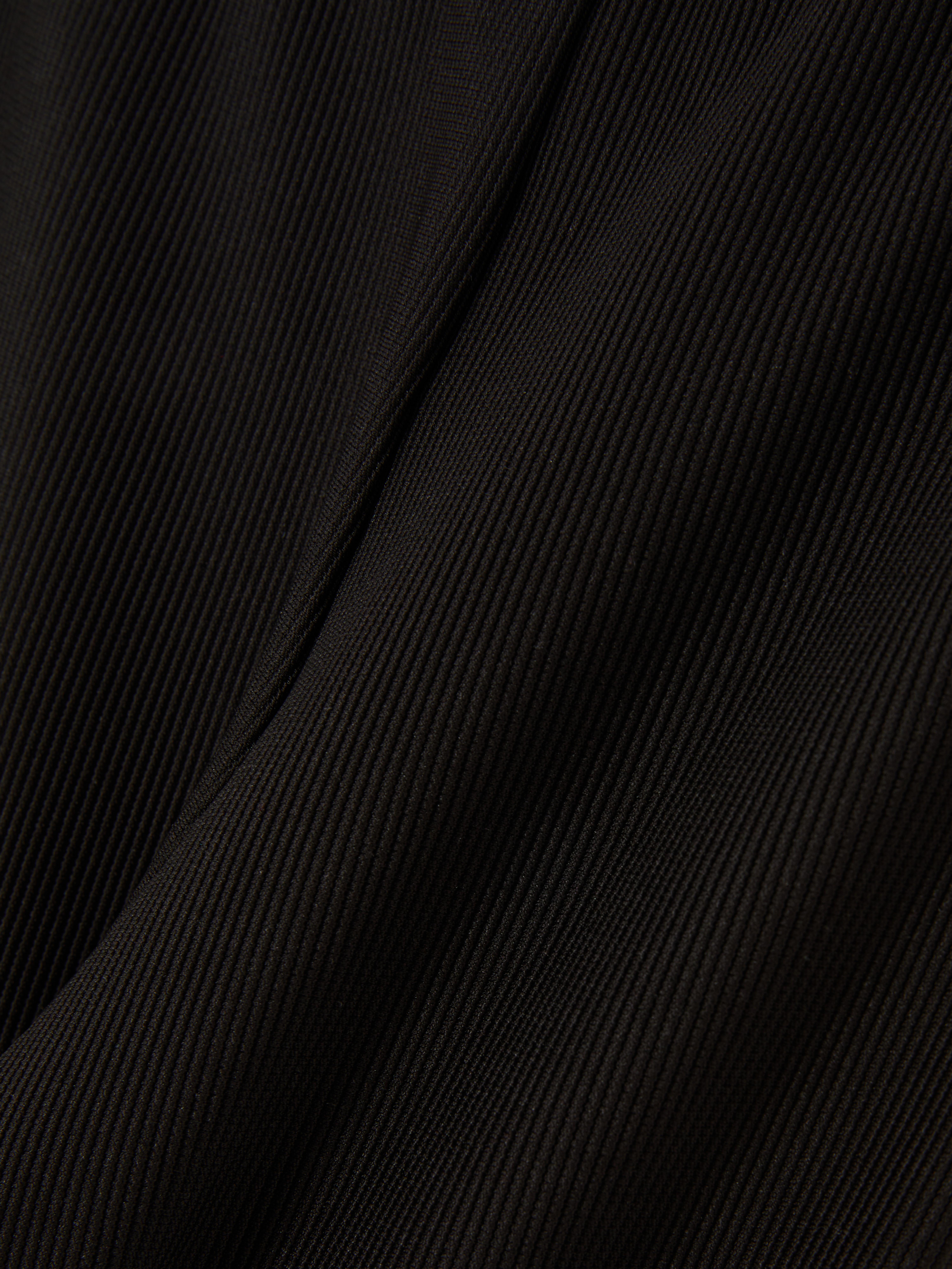 Pantalones elásticos de campana