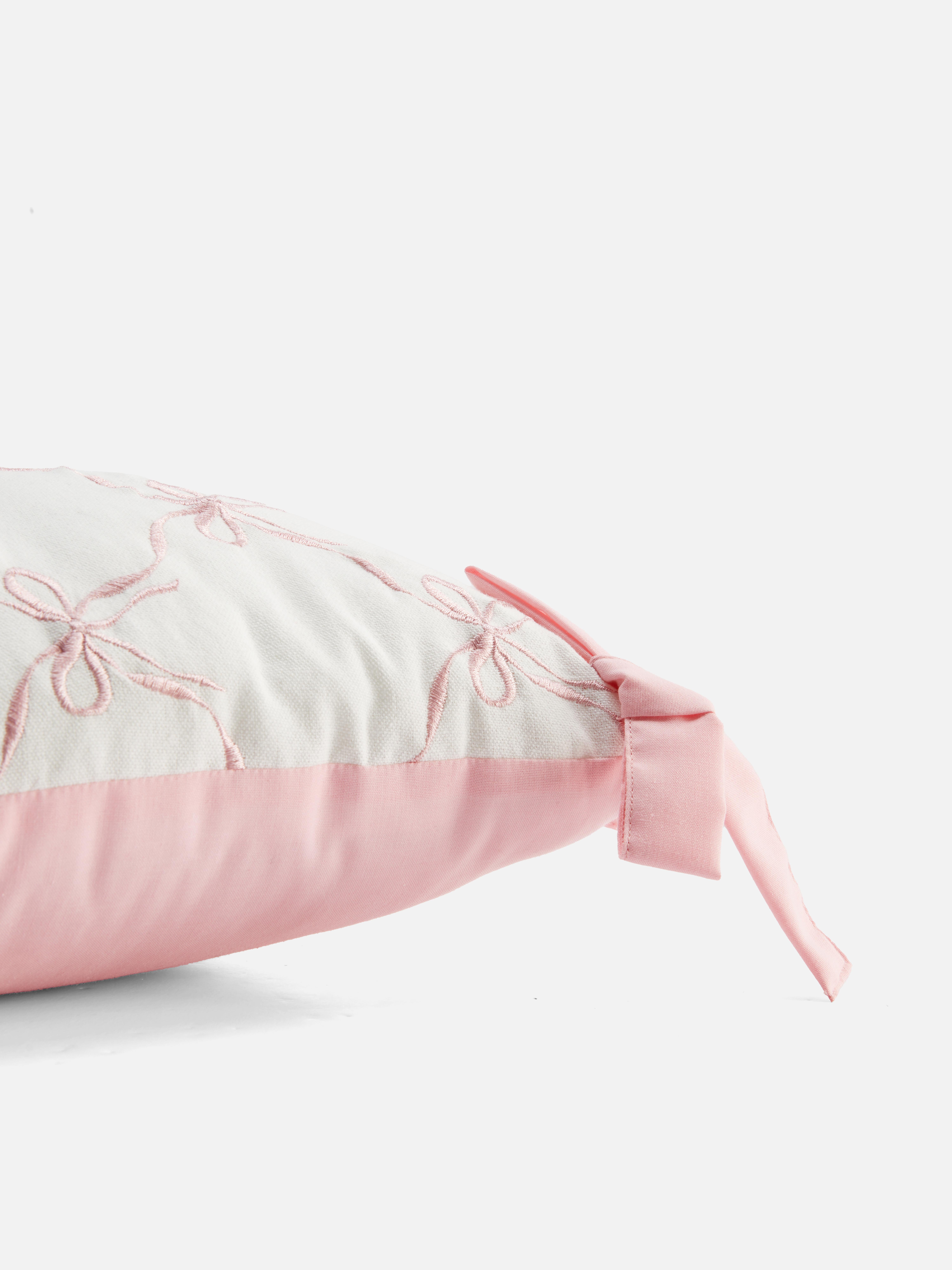 Bow Detail Bolster Cushion