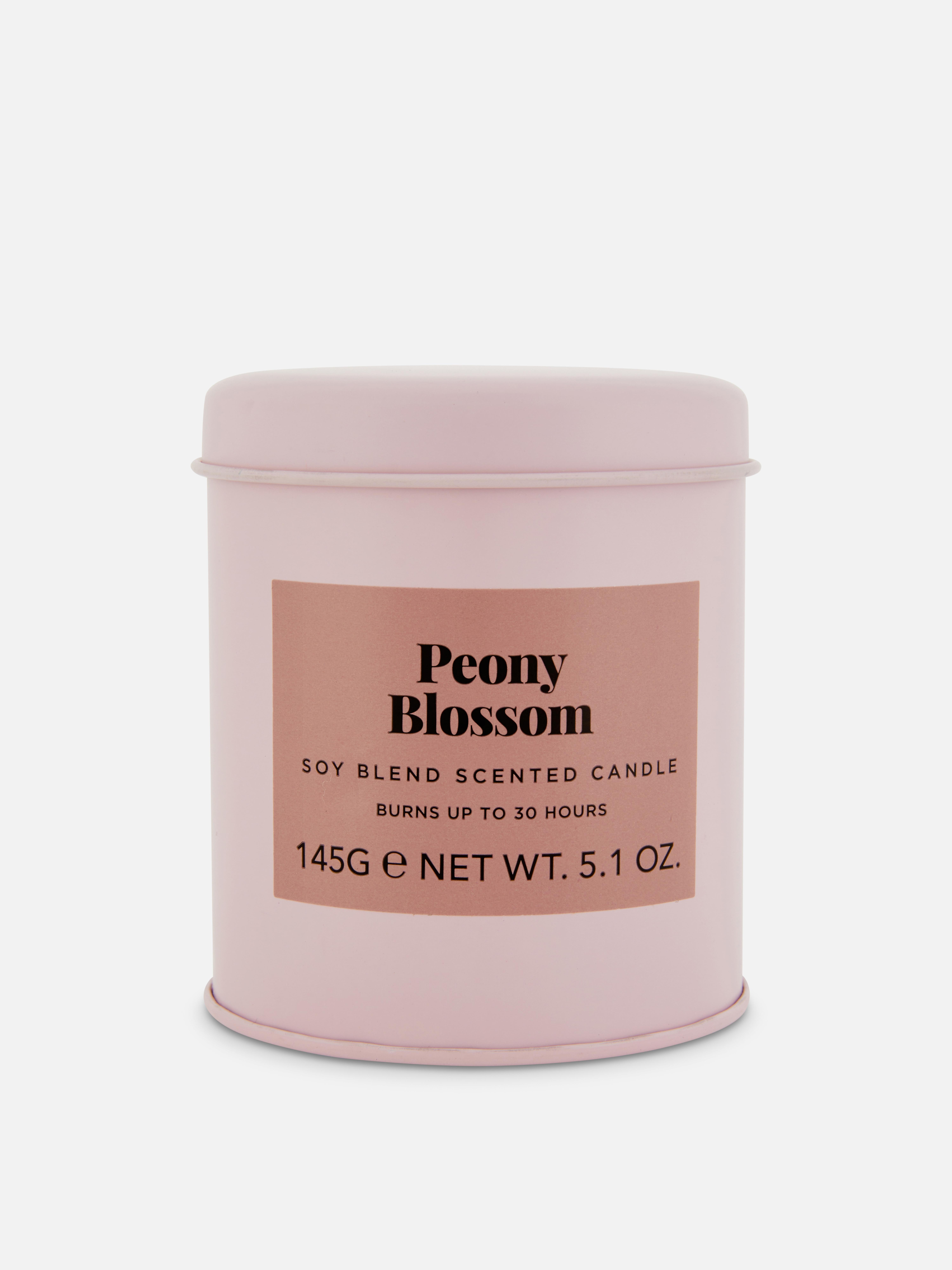 Bougie parfumée dans une boîte métallique moyenne