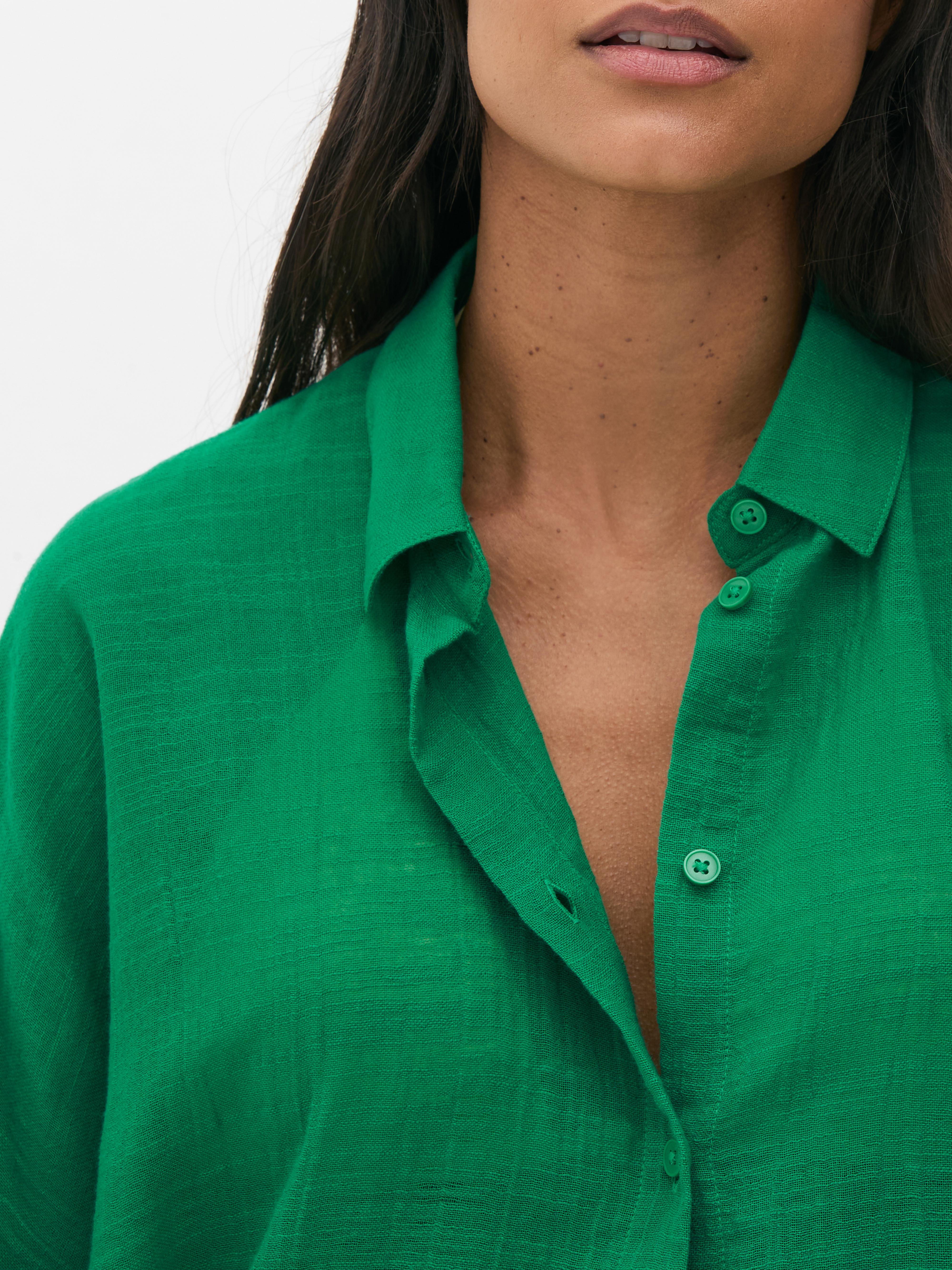 Camicia copricostume con bottoni