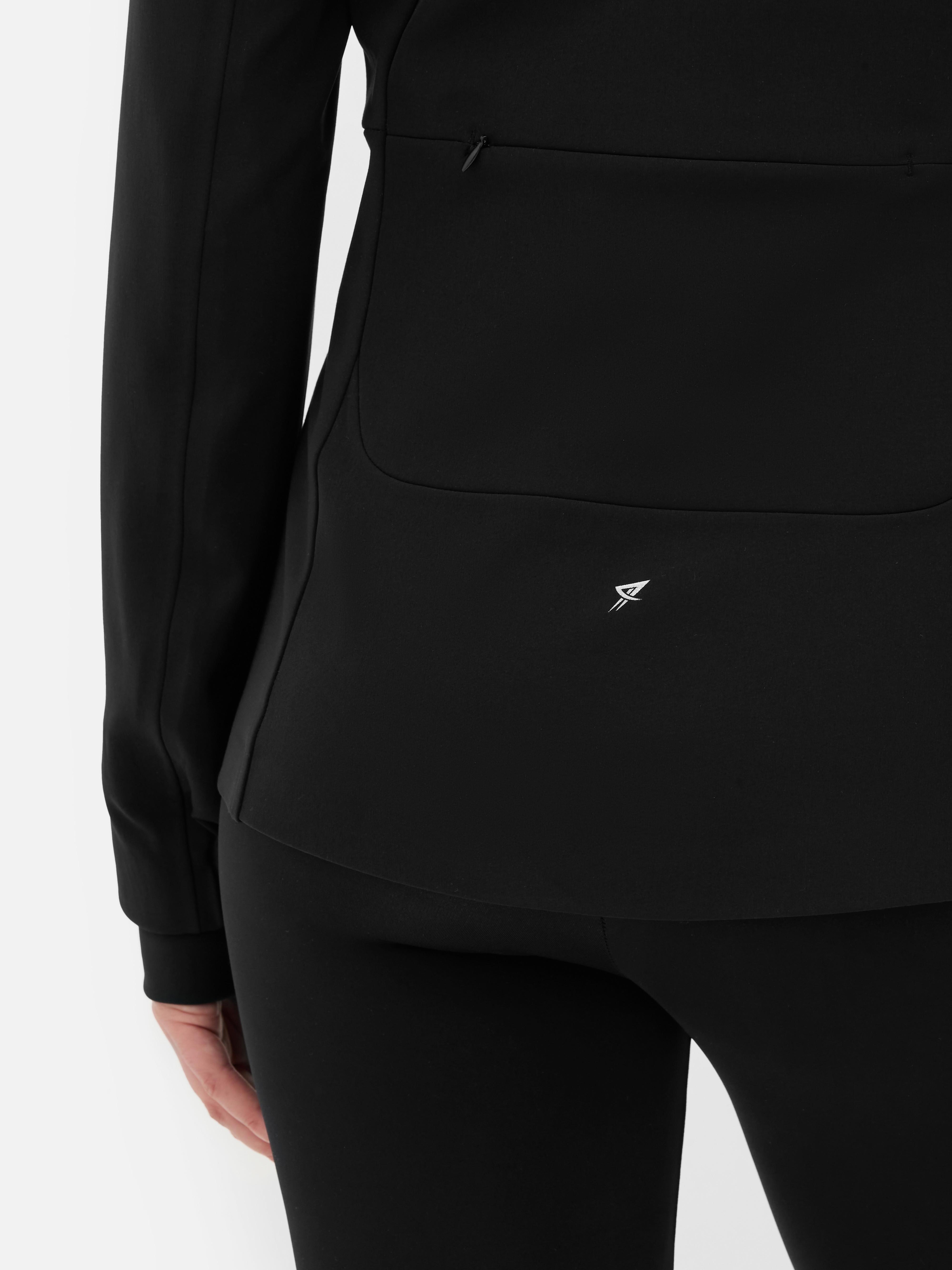 Chaqueta deportiva con capucha y cremallera