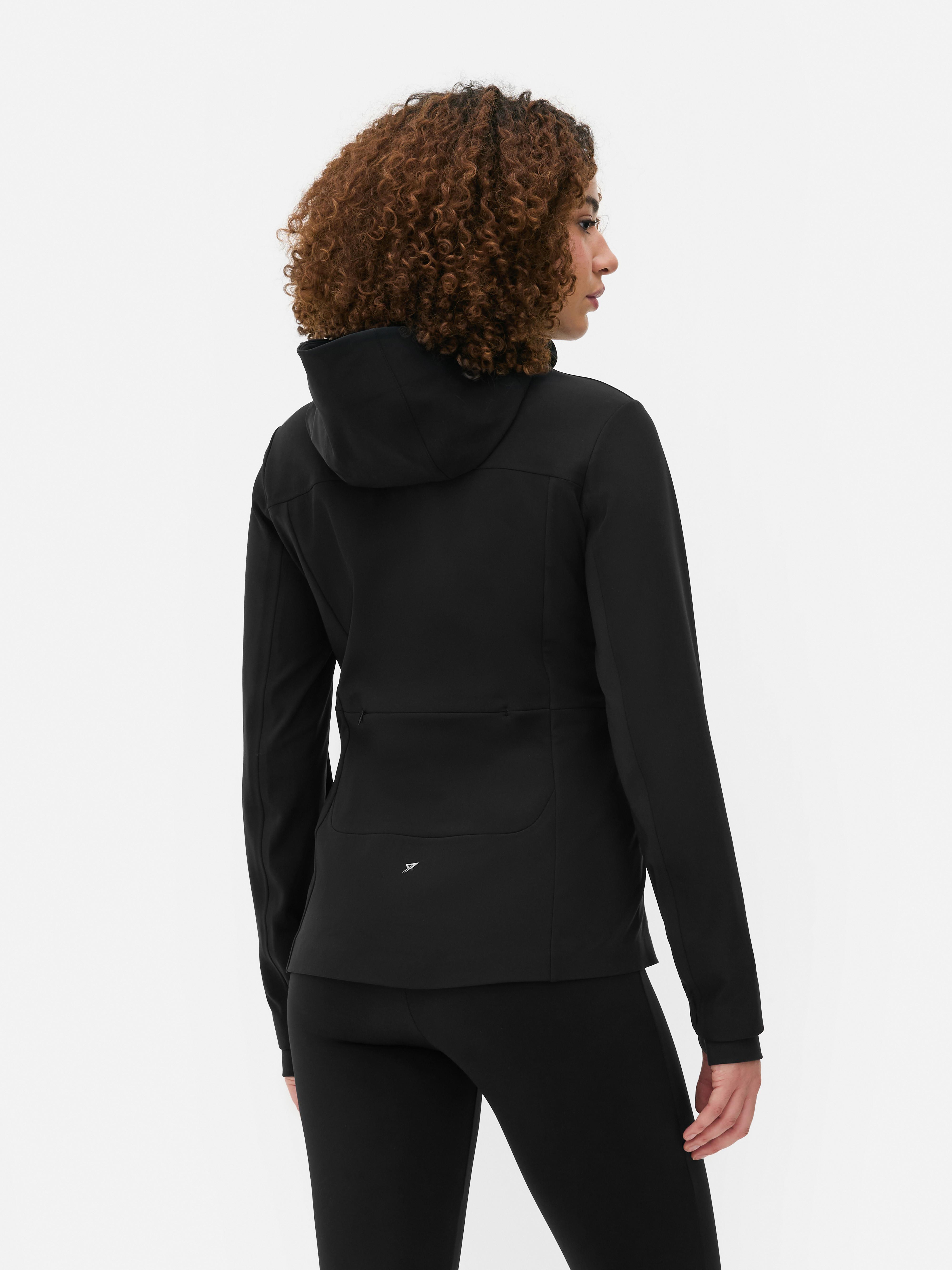 Chaqueta deportiva con capucha y cremallera