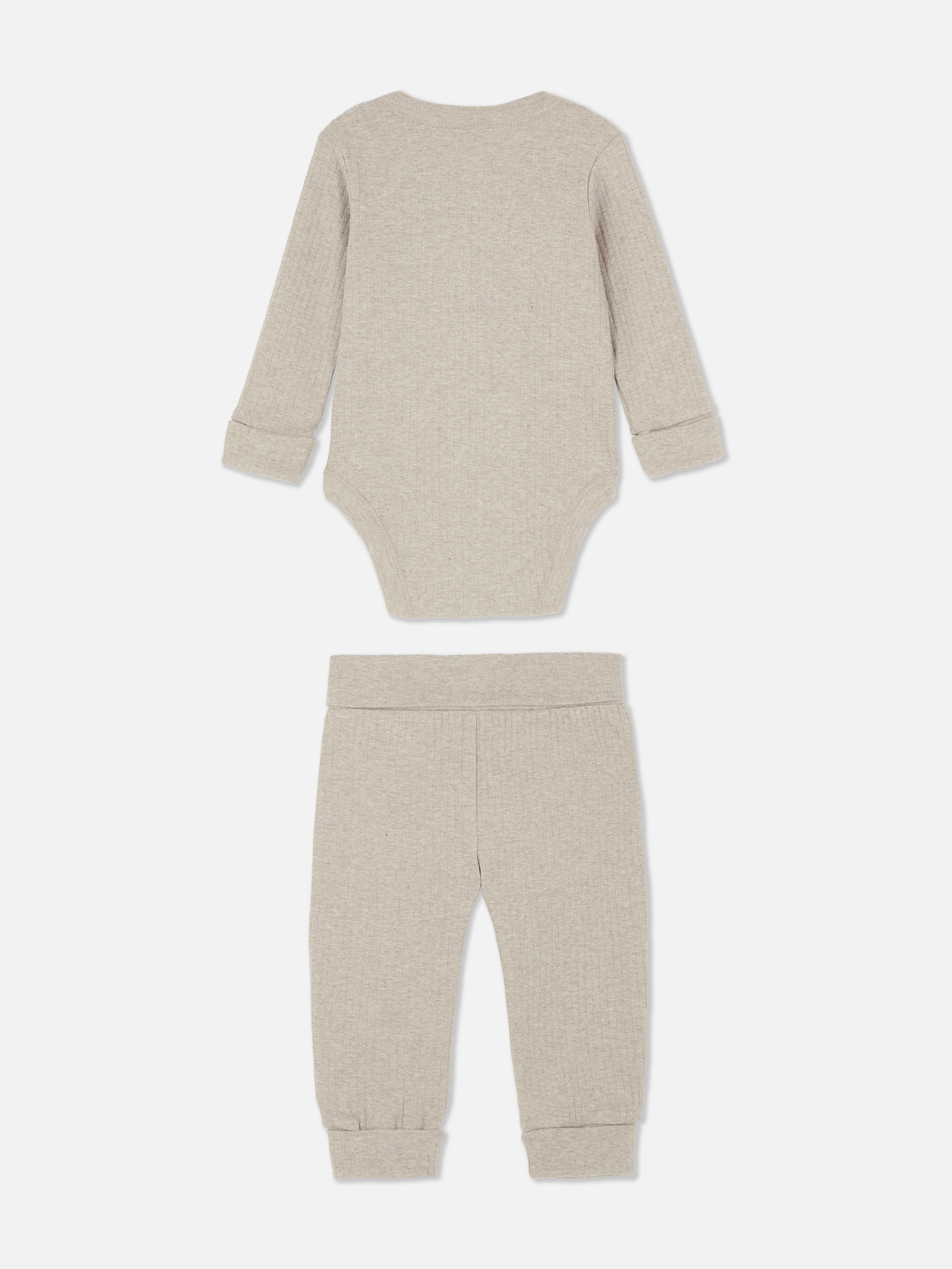 Romper met overslag en legging voor pasgeborenen