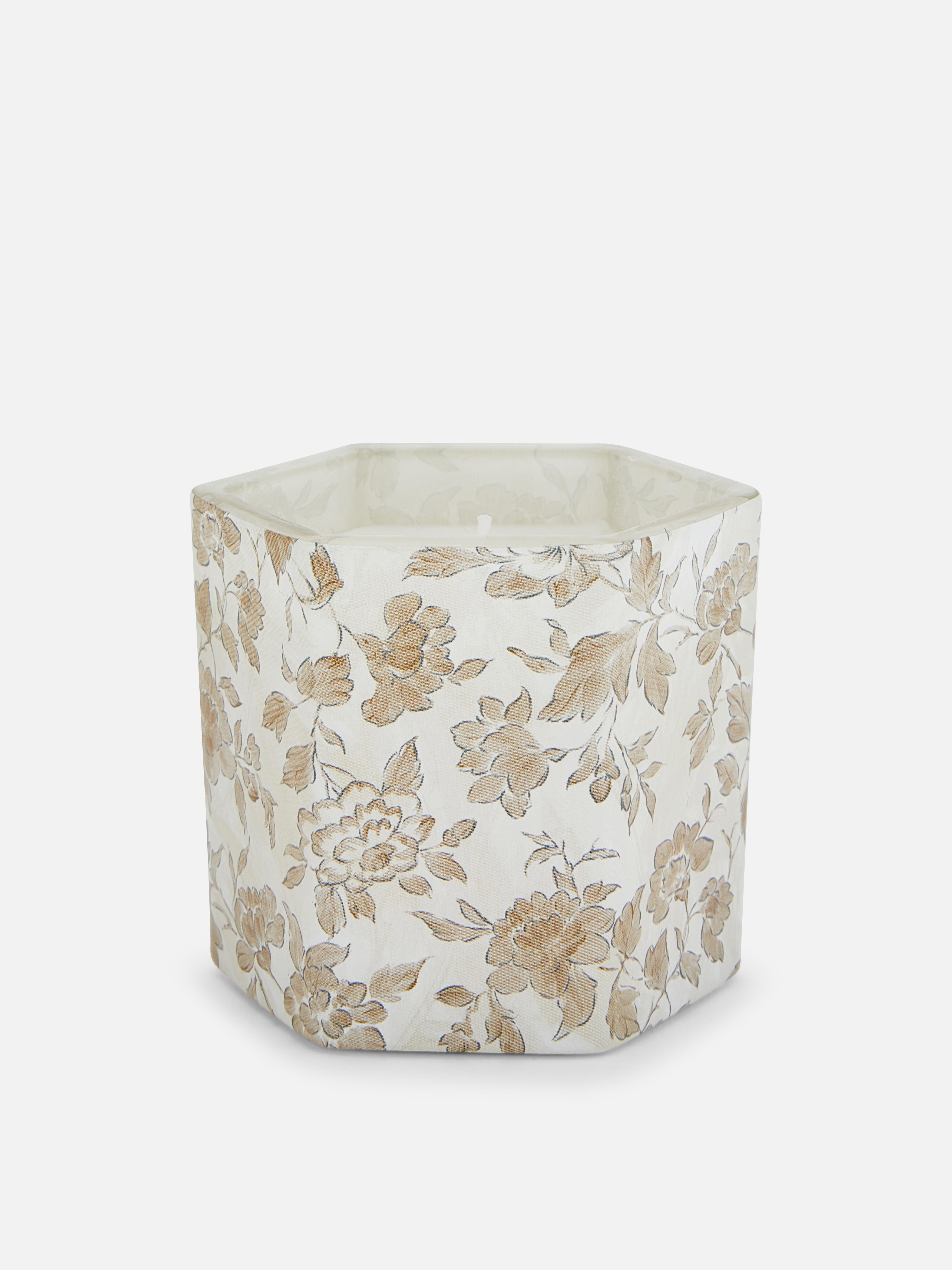 Kaars in zeshoekige pot met bloemenpatroon
