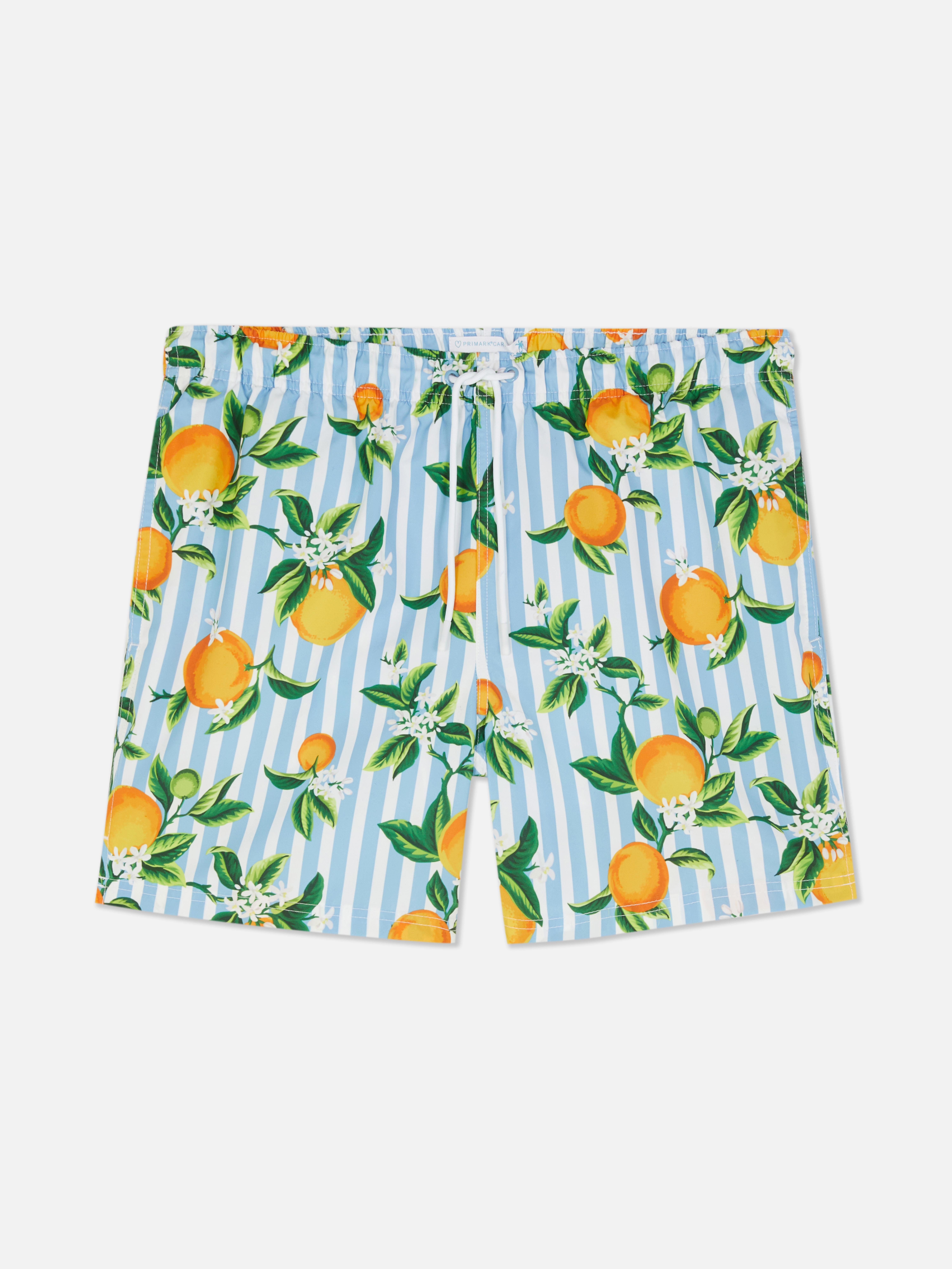 Badeshorts mit Streifen- und Orangenmuster