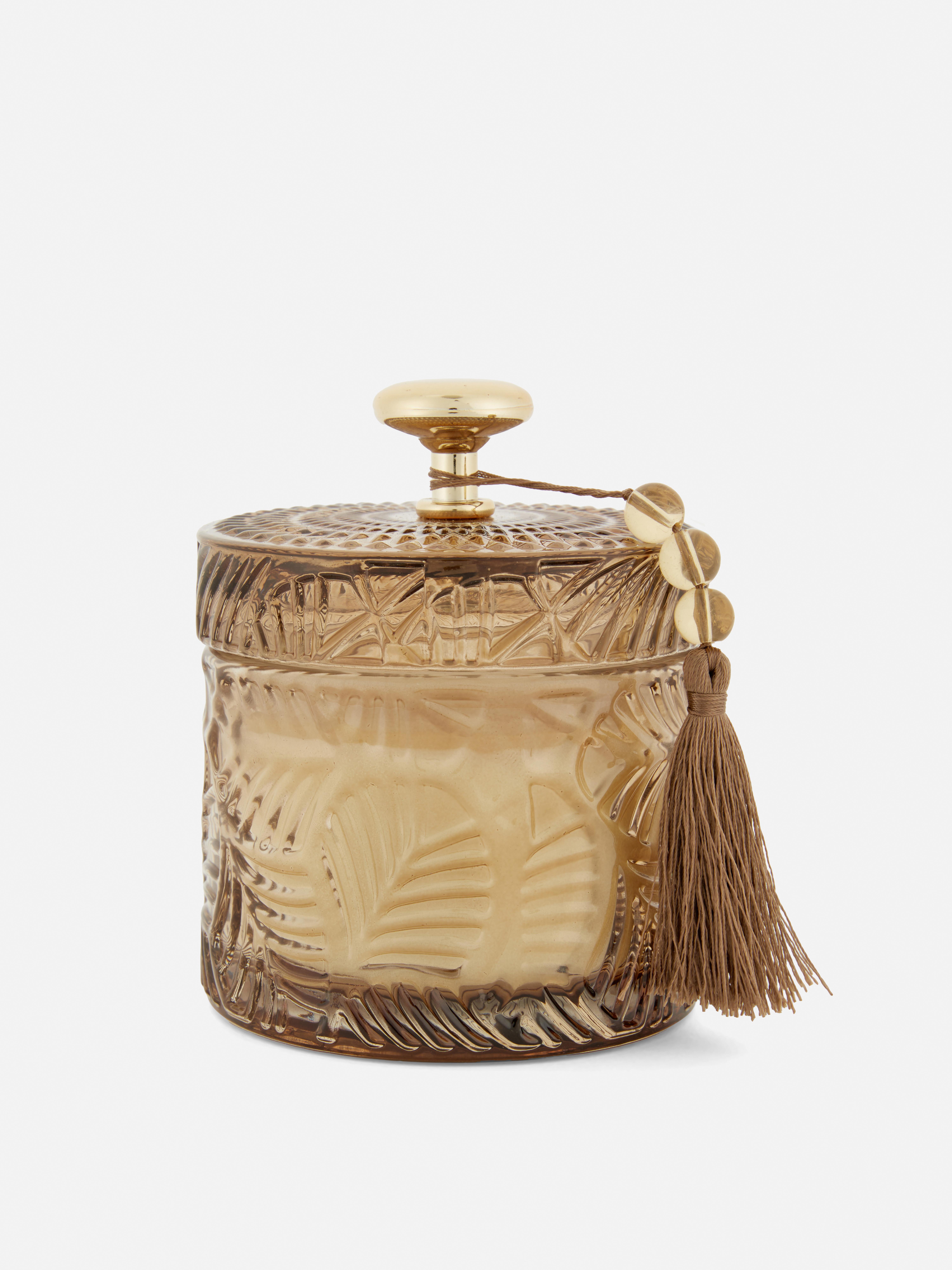 Bougie dans un pot en verre texturé