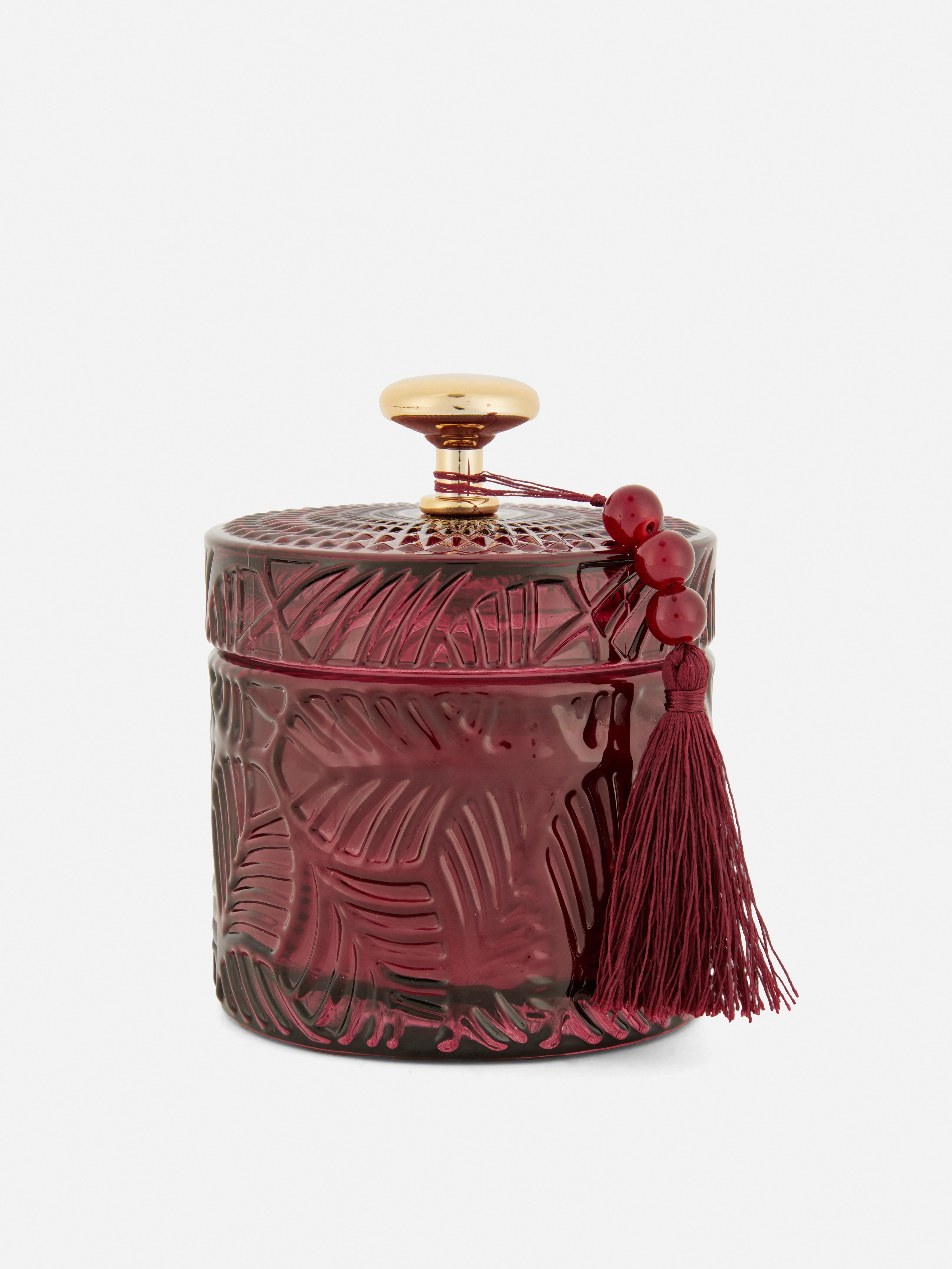 Bougie dans un pot en verre texturé
