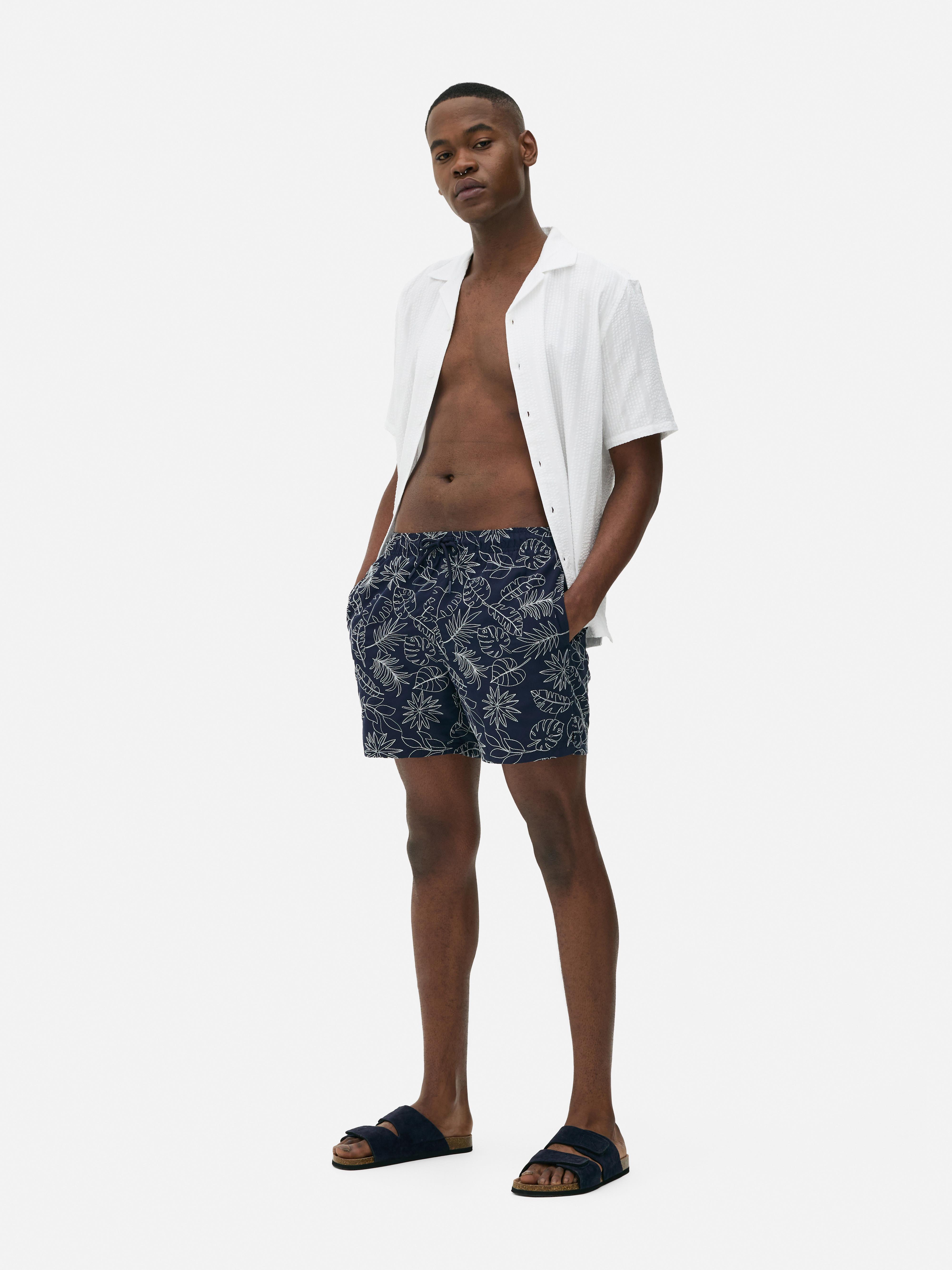 Boardshort met geborduurd bladmotief Marineblauw