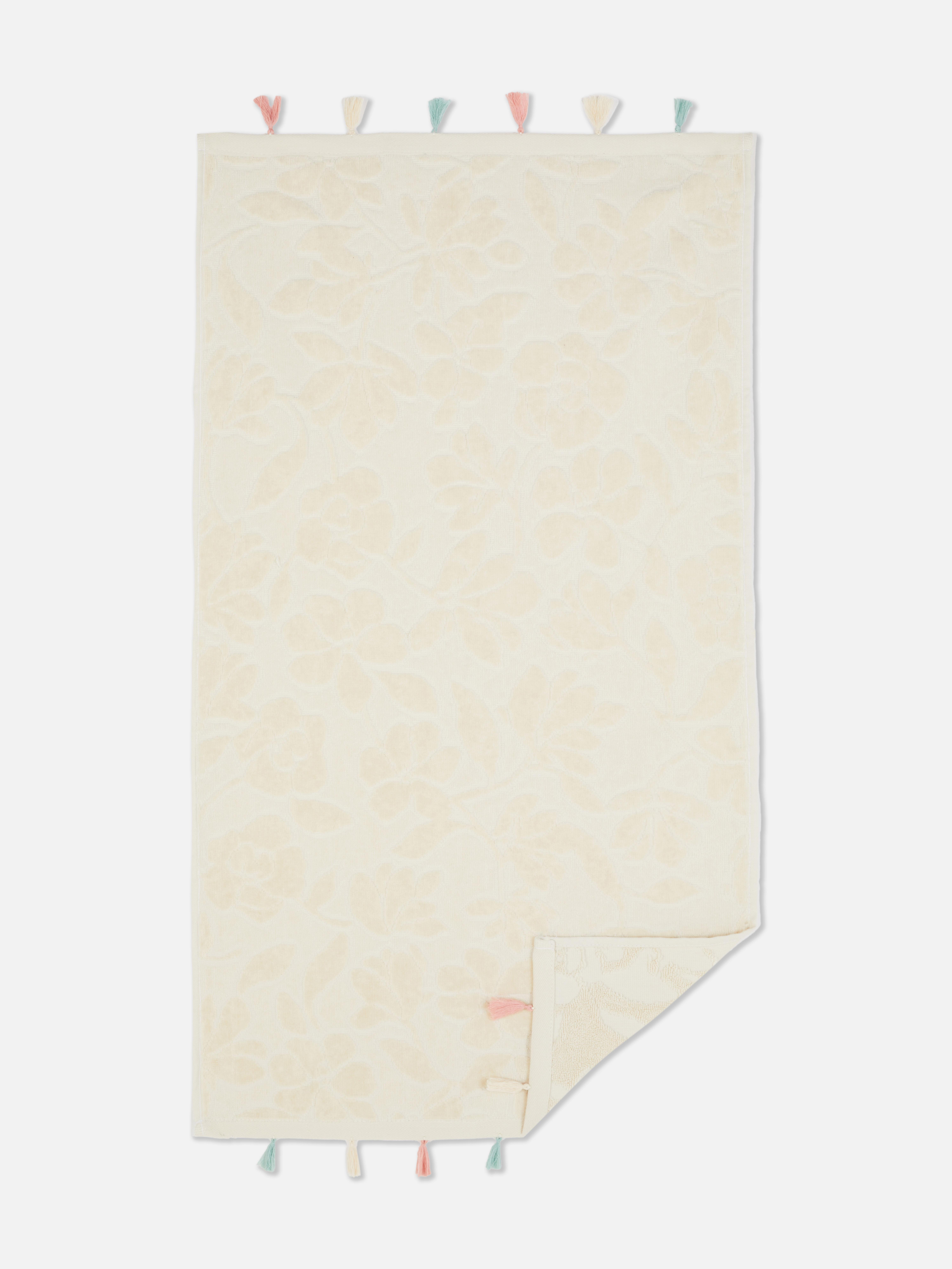Serviette essuie-mains en jacquard à bords tuftés