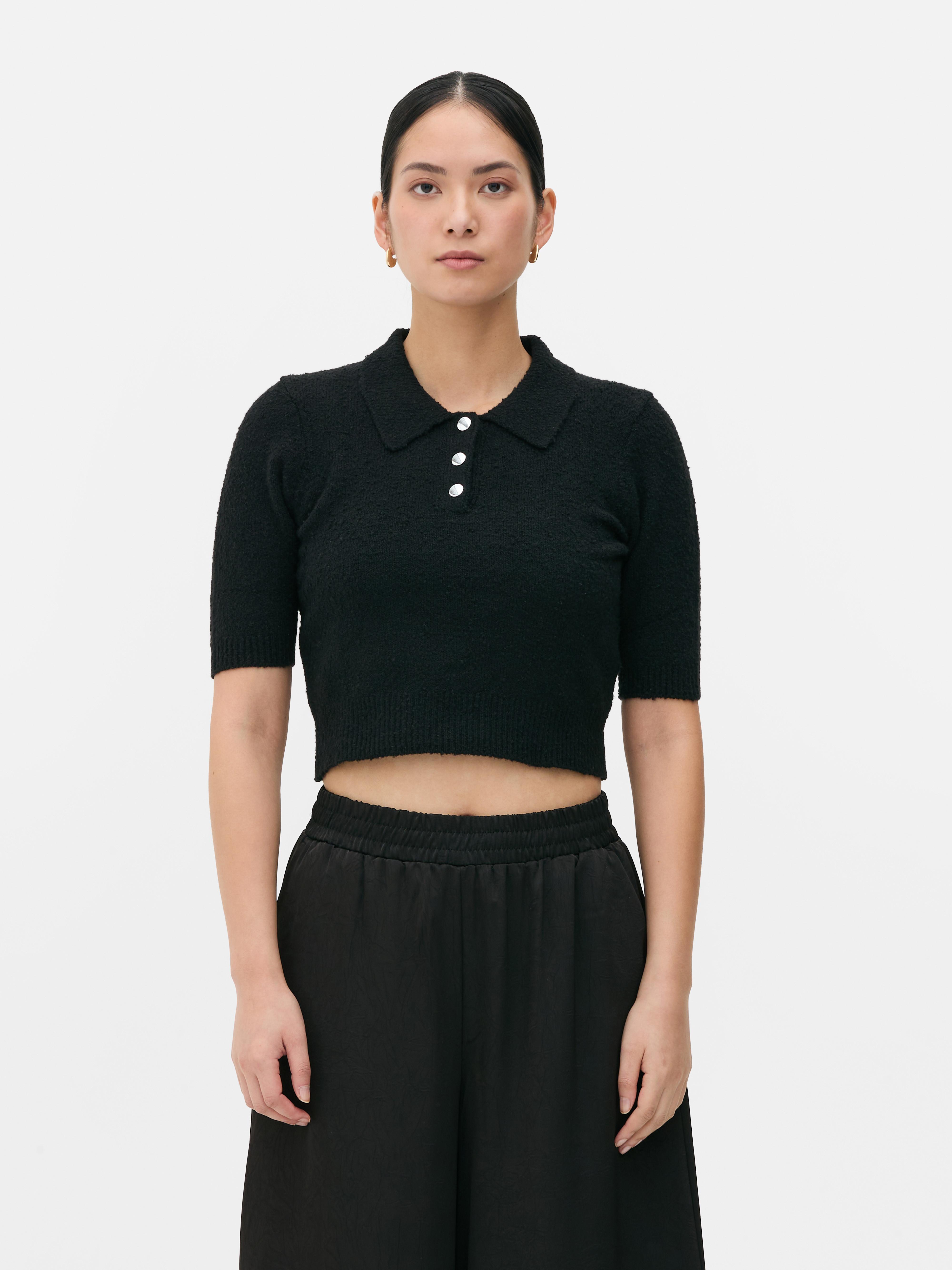 Jersey de manga corta con cuello abotonado Negro