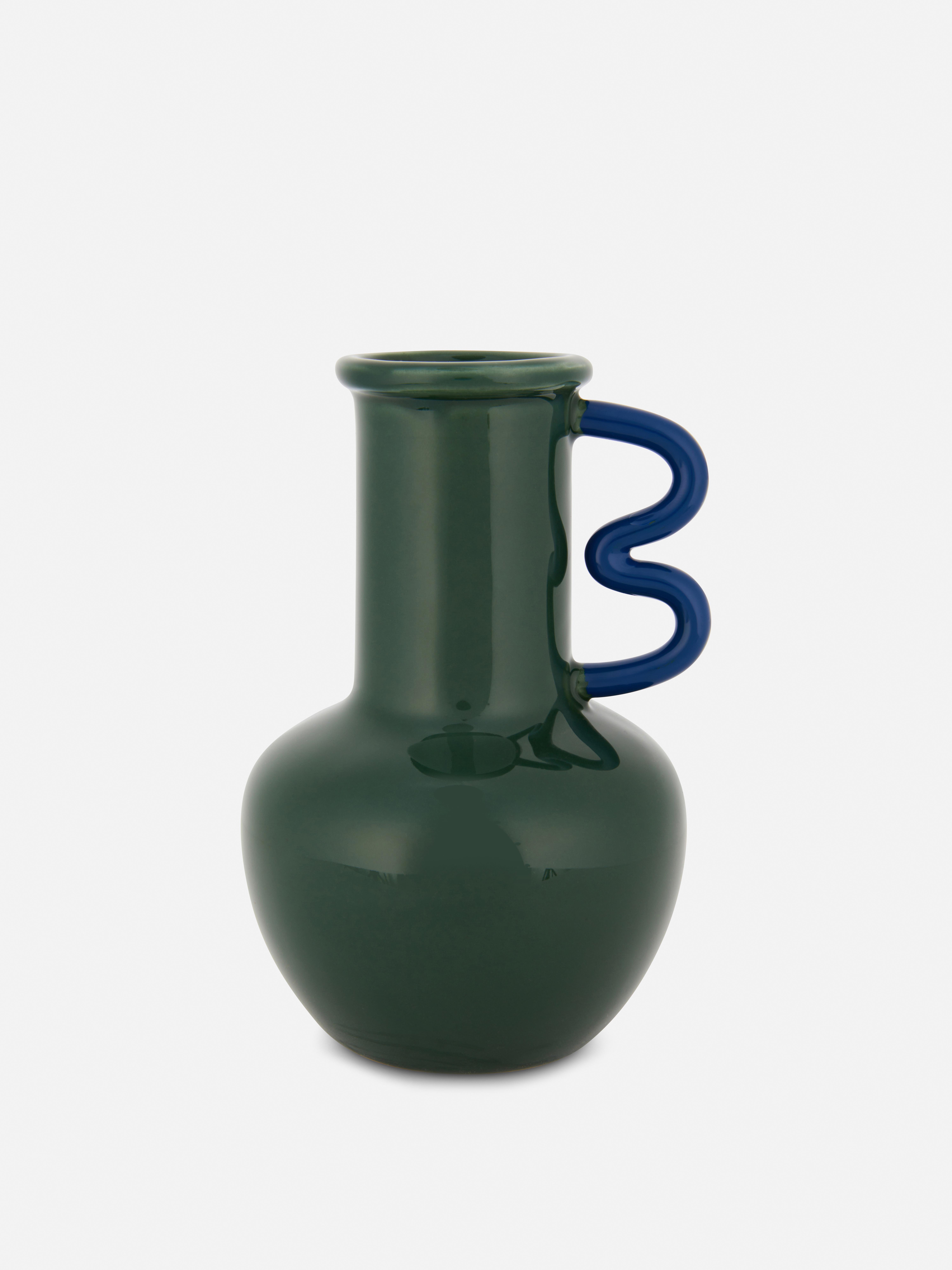 Caraffa soprammobile con manico a onda