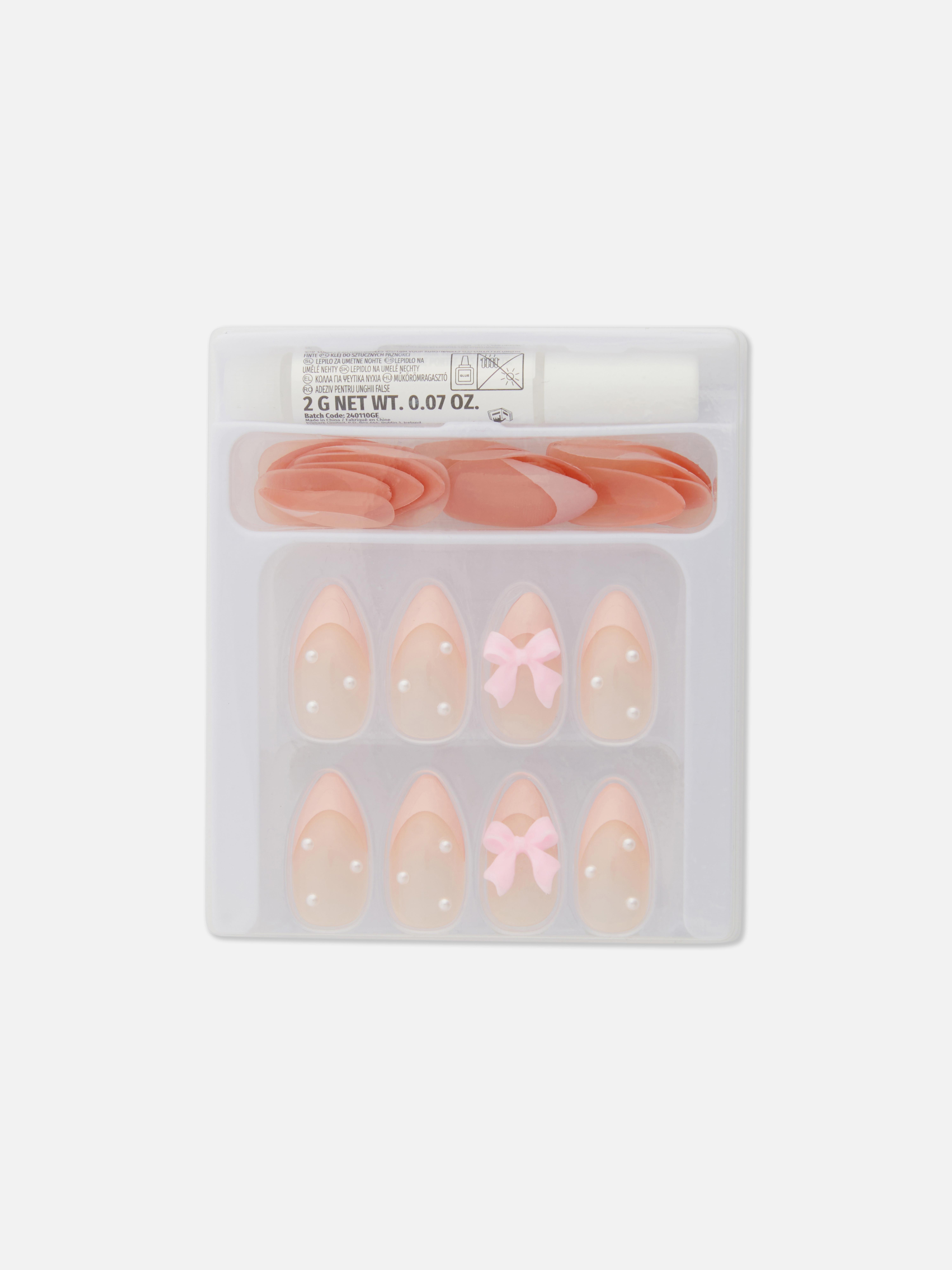 Zelfklevende kunstnagels met roze strikje