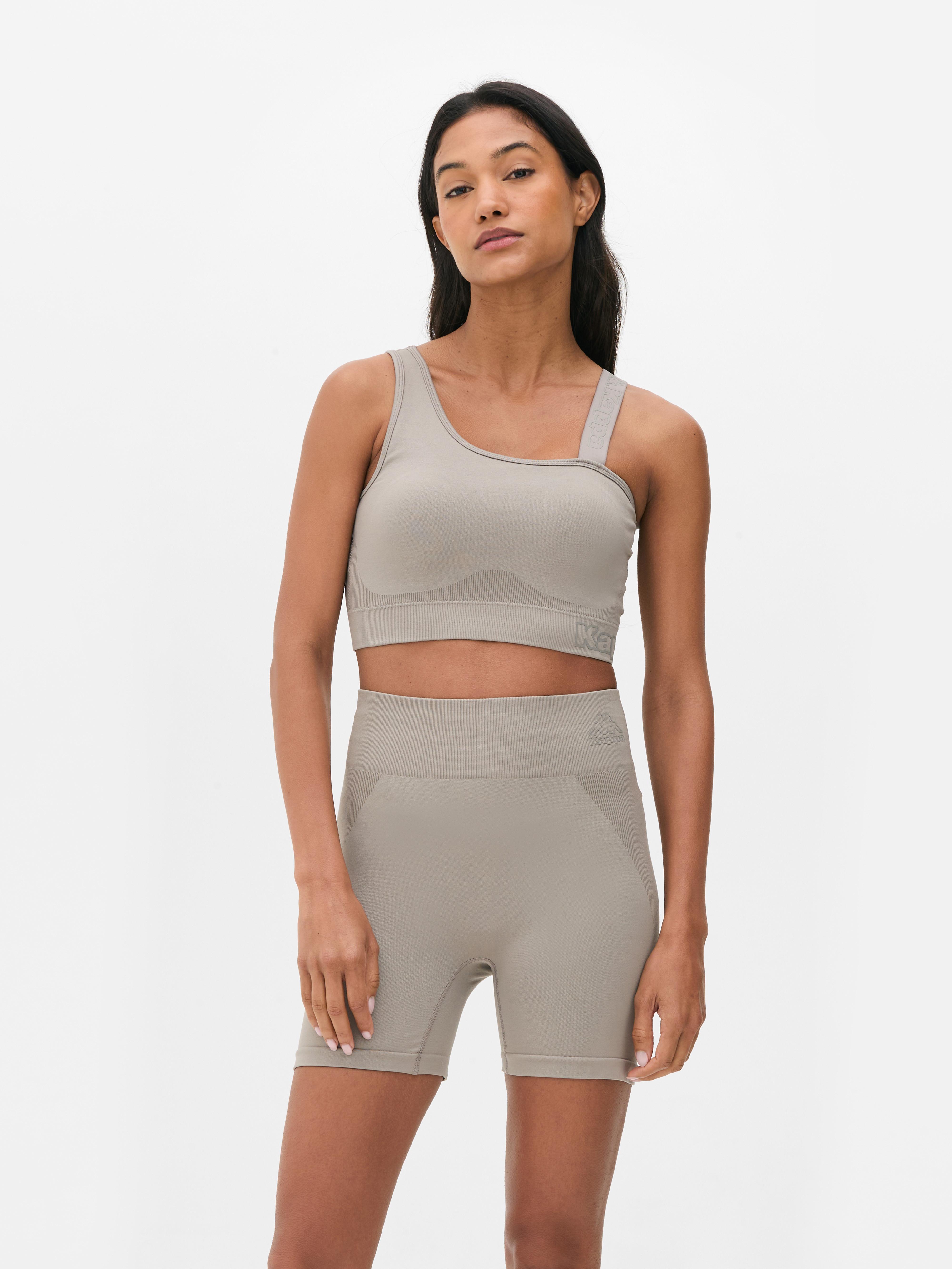 Top corto asimmetrico Kappa x Primark