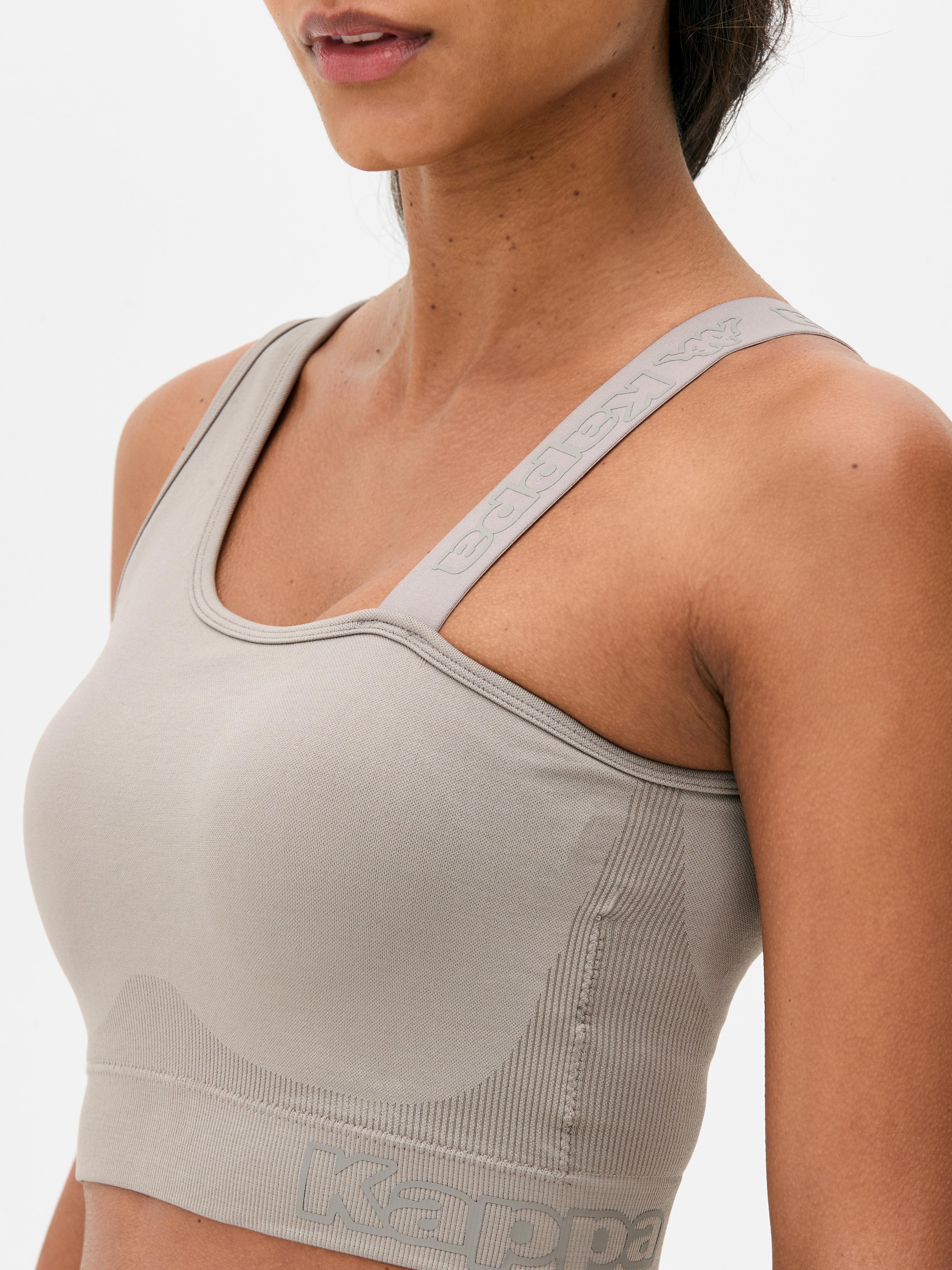 Top corto asimmetrico Kappa x Primark