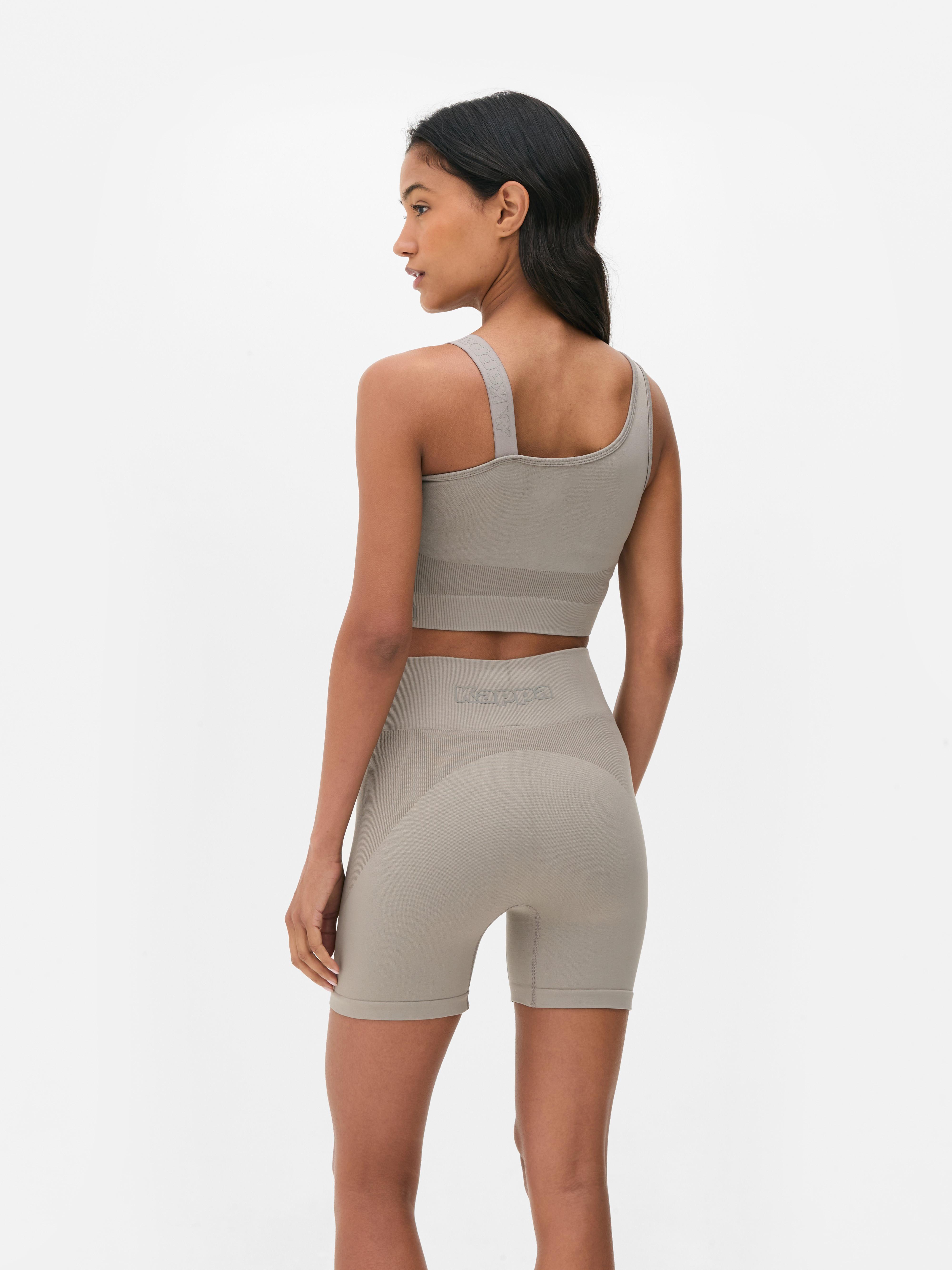 Top corto asimmetrico Kappa x Primark