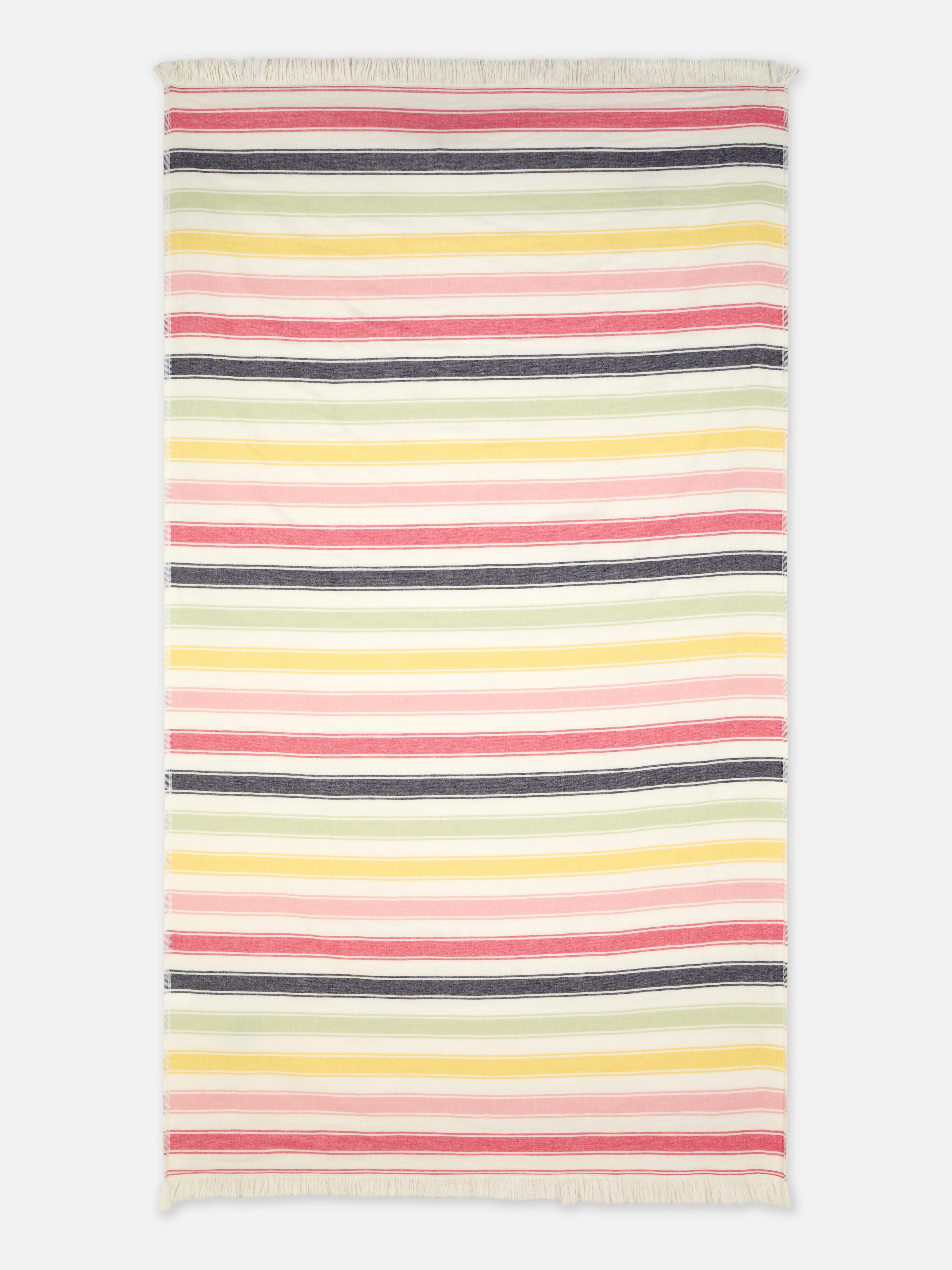 Serviette de plage style hammam à pampilles