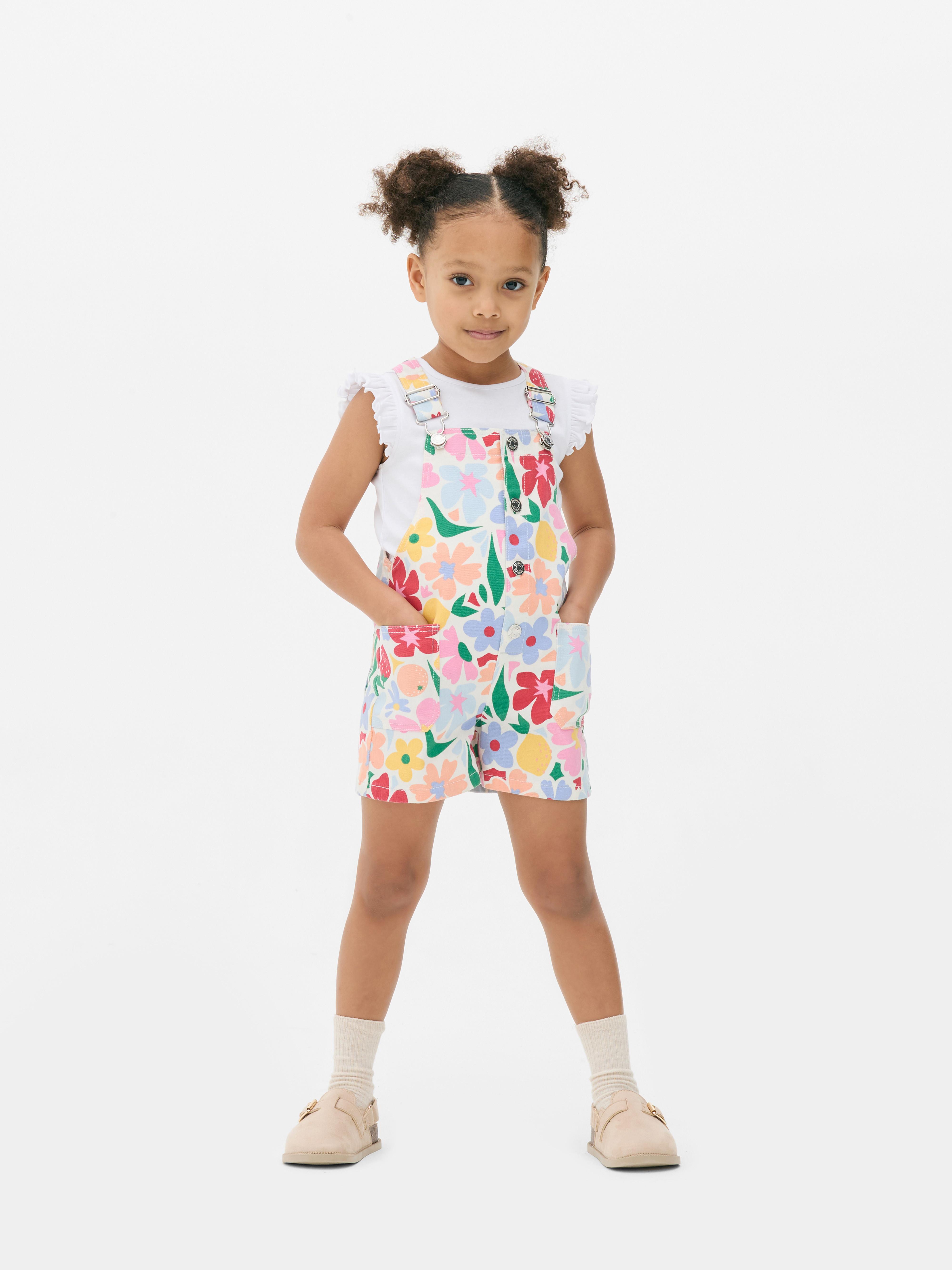 Ensemble avec salopette à fleurs