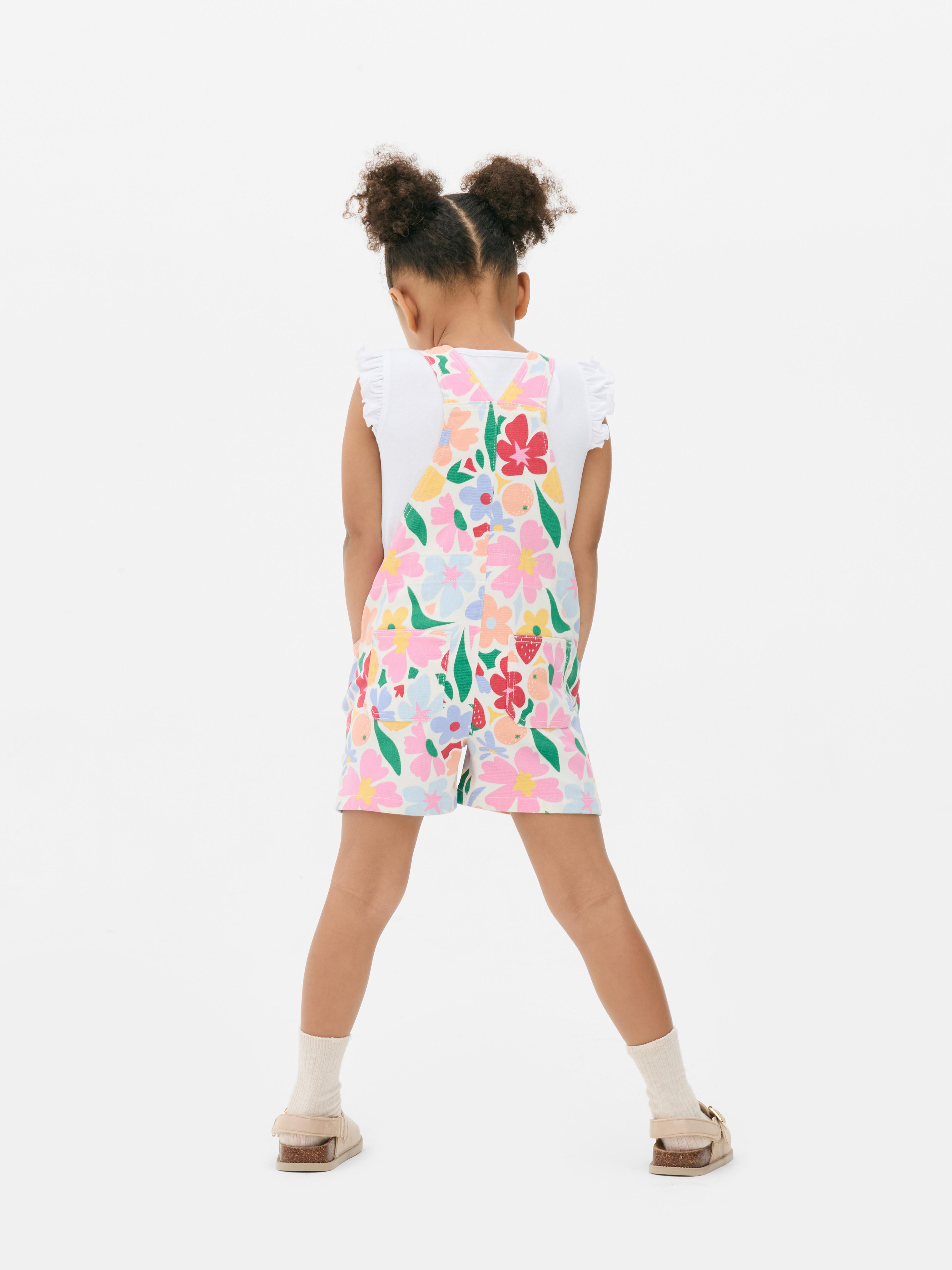 Ensemble avec salopette à fleurs