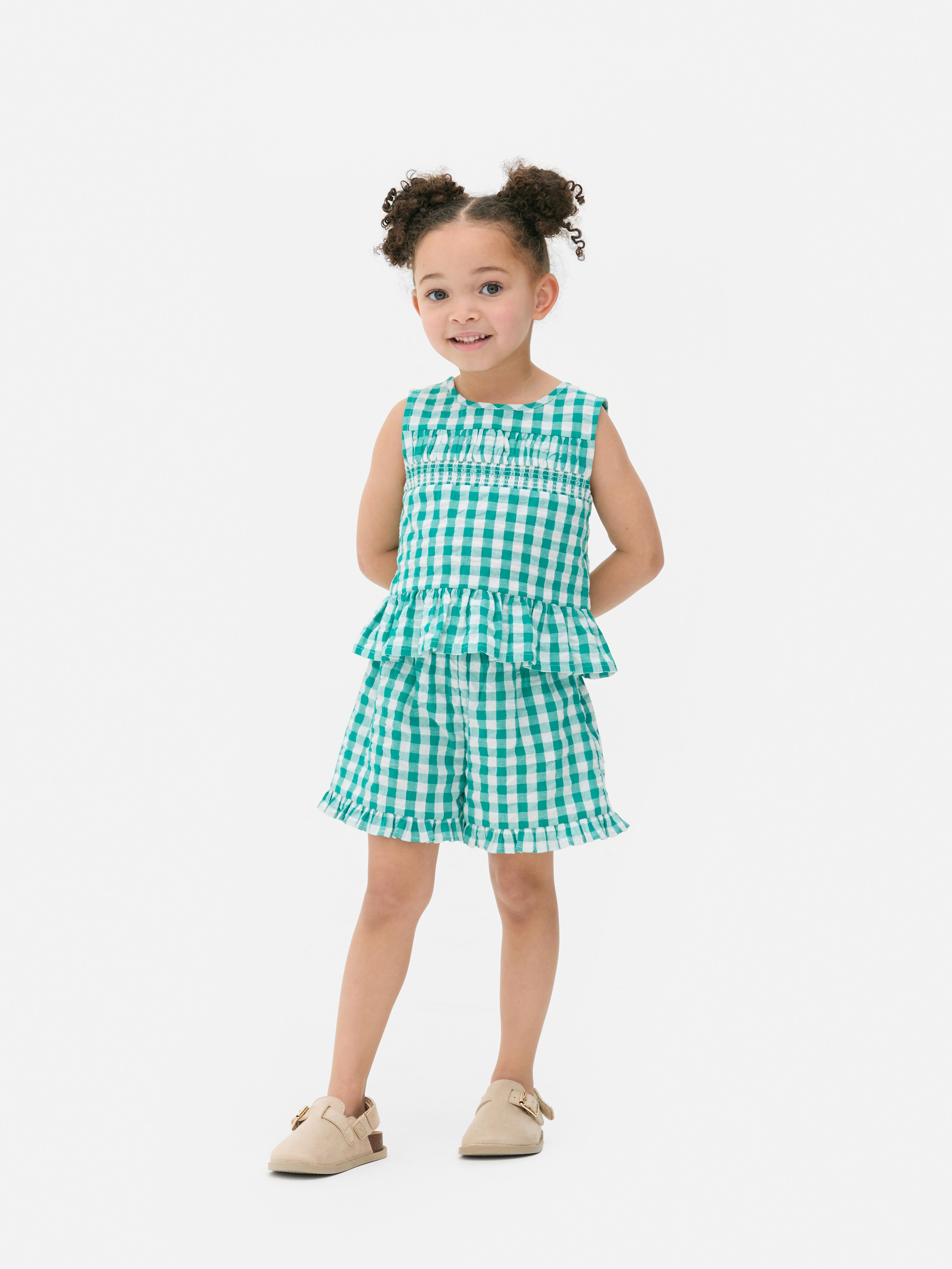 Conjunto de blusa y pantalón corto a cuadros