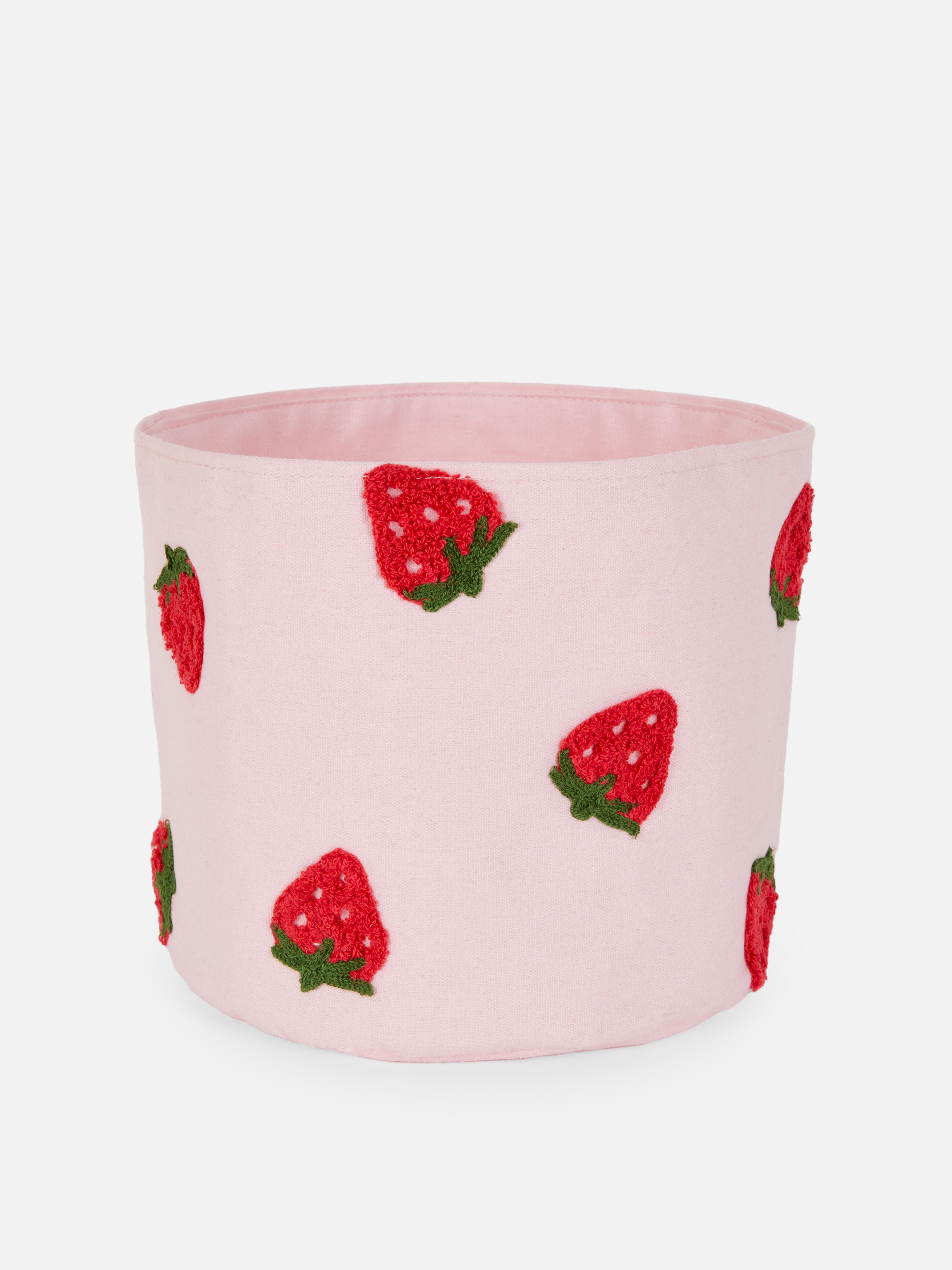 Cesta de almacenamiento con fresas en relieve