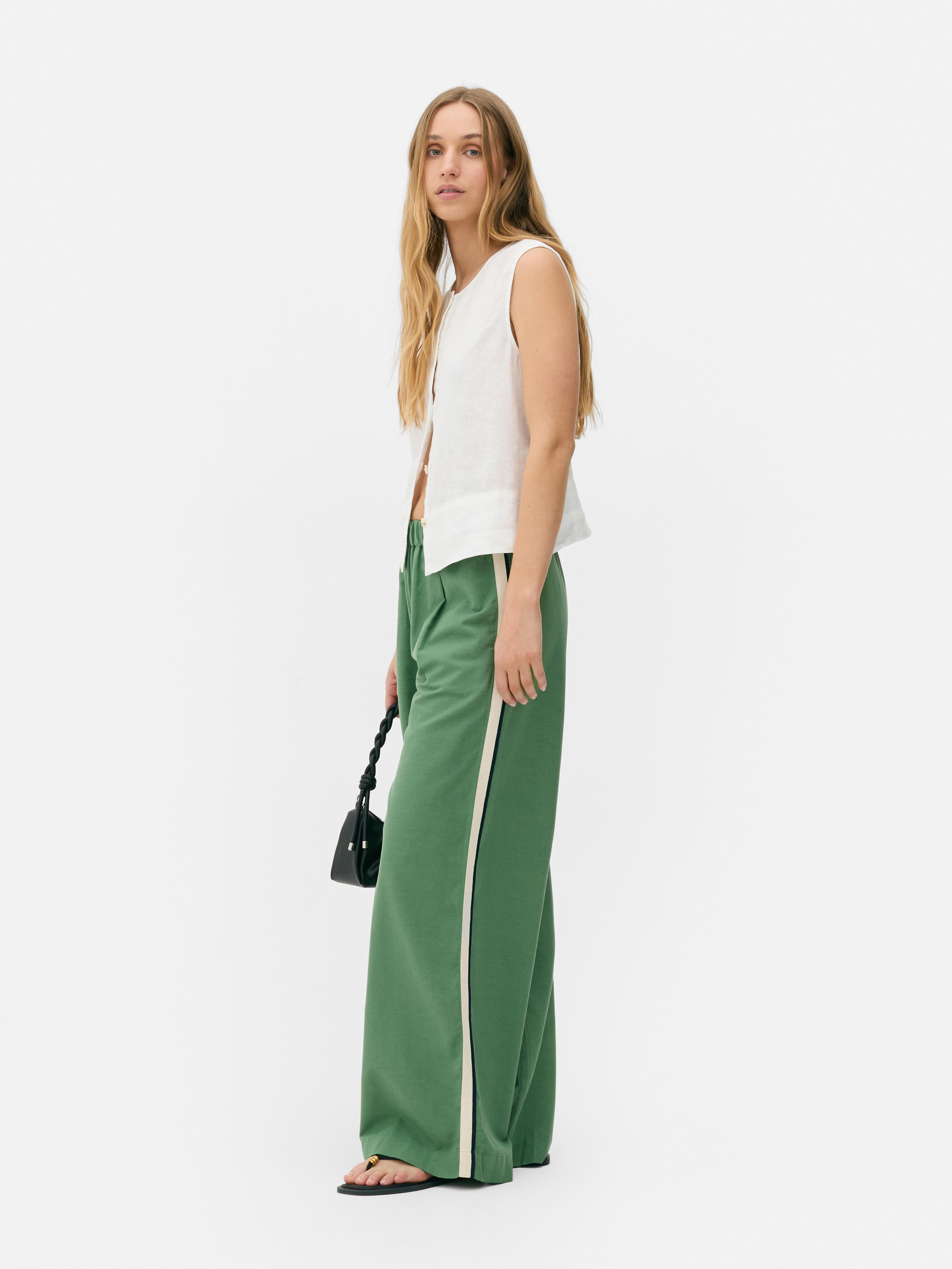 Pantalones de pernera ancha con rayas laterales