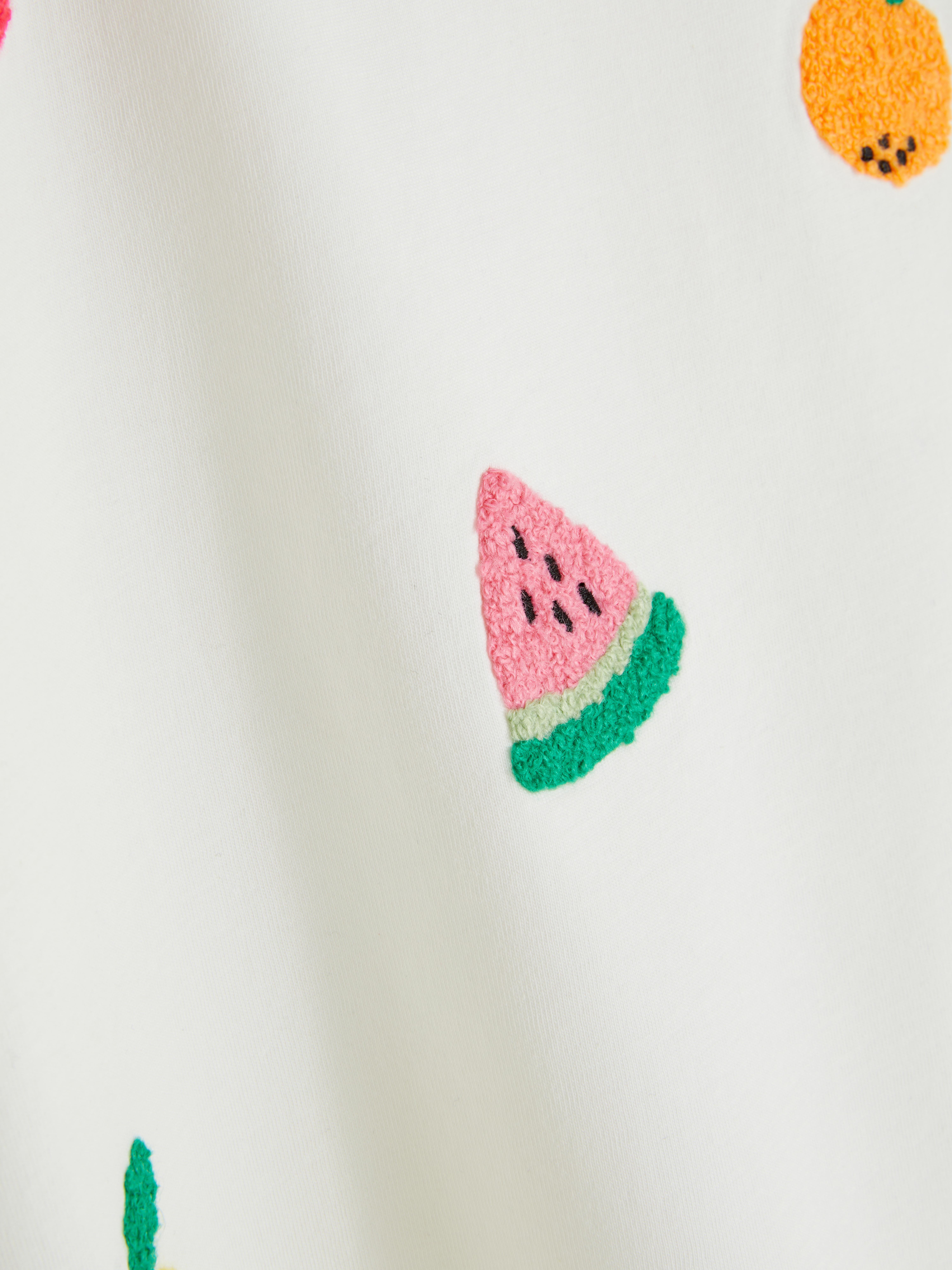 T-shirt à fruit bouclé