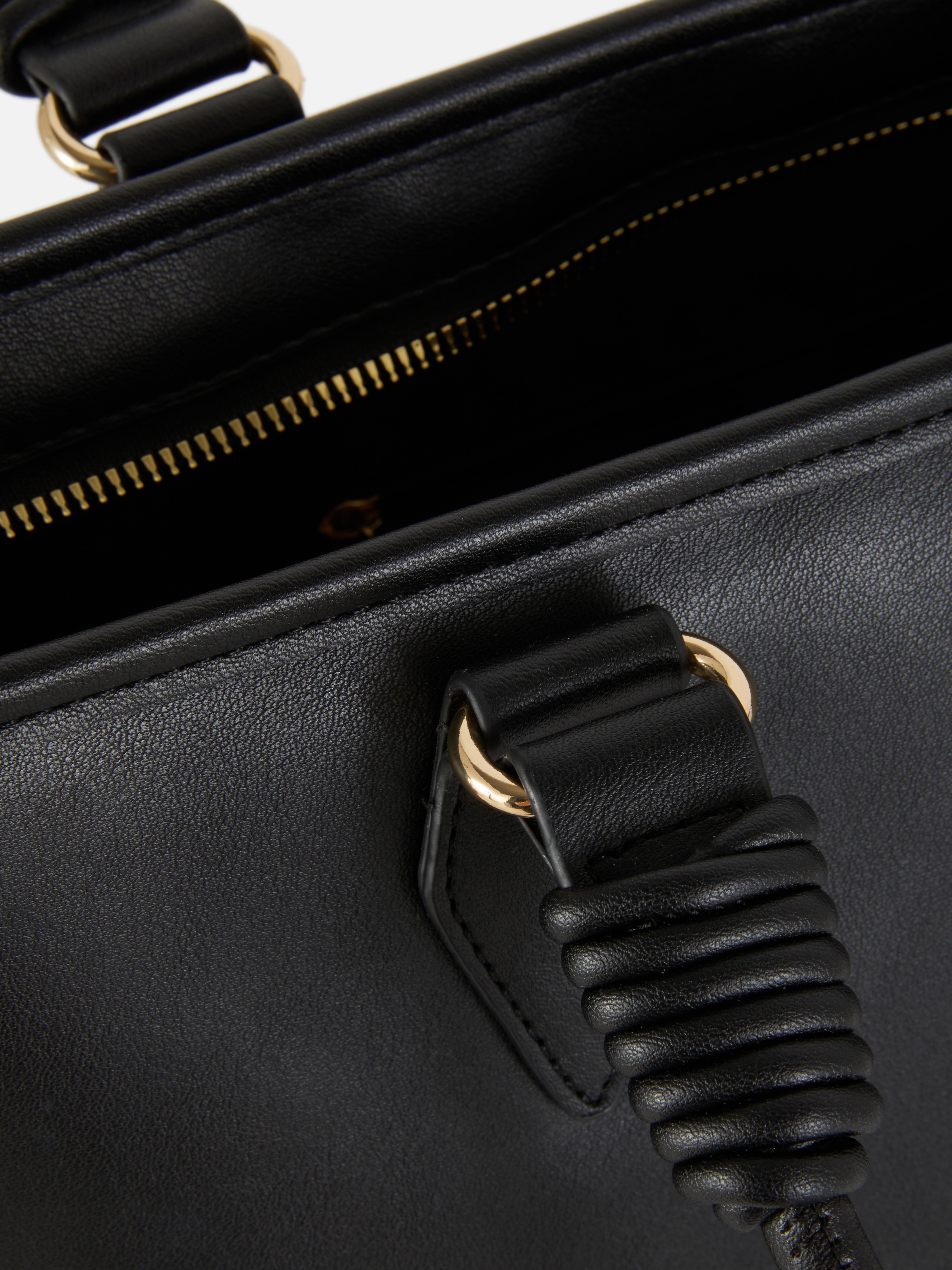 Shopper met gedraaide handgreep