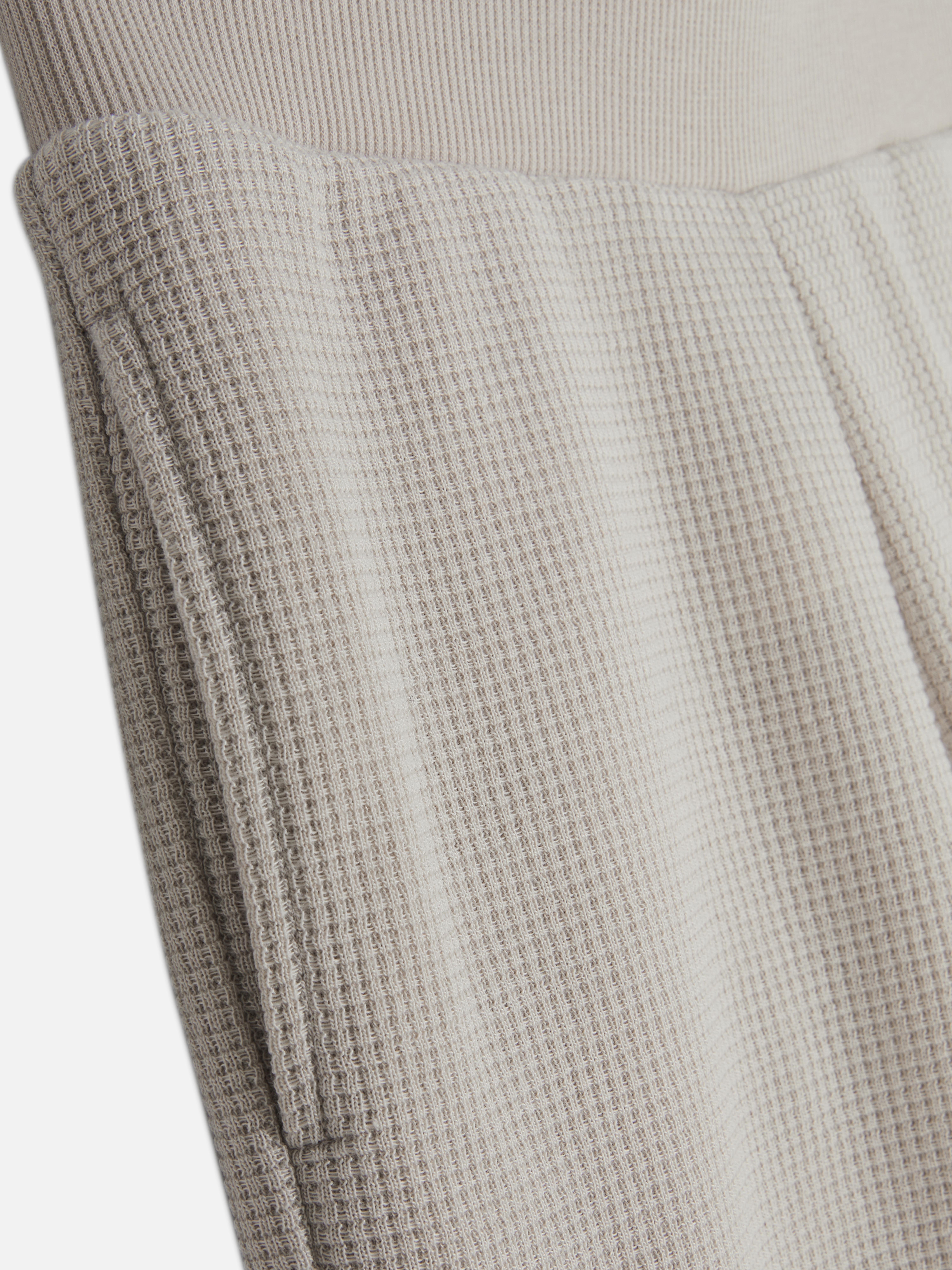 Pantaloni da tuta a nido d'ape svasati