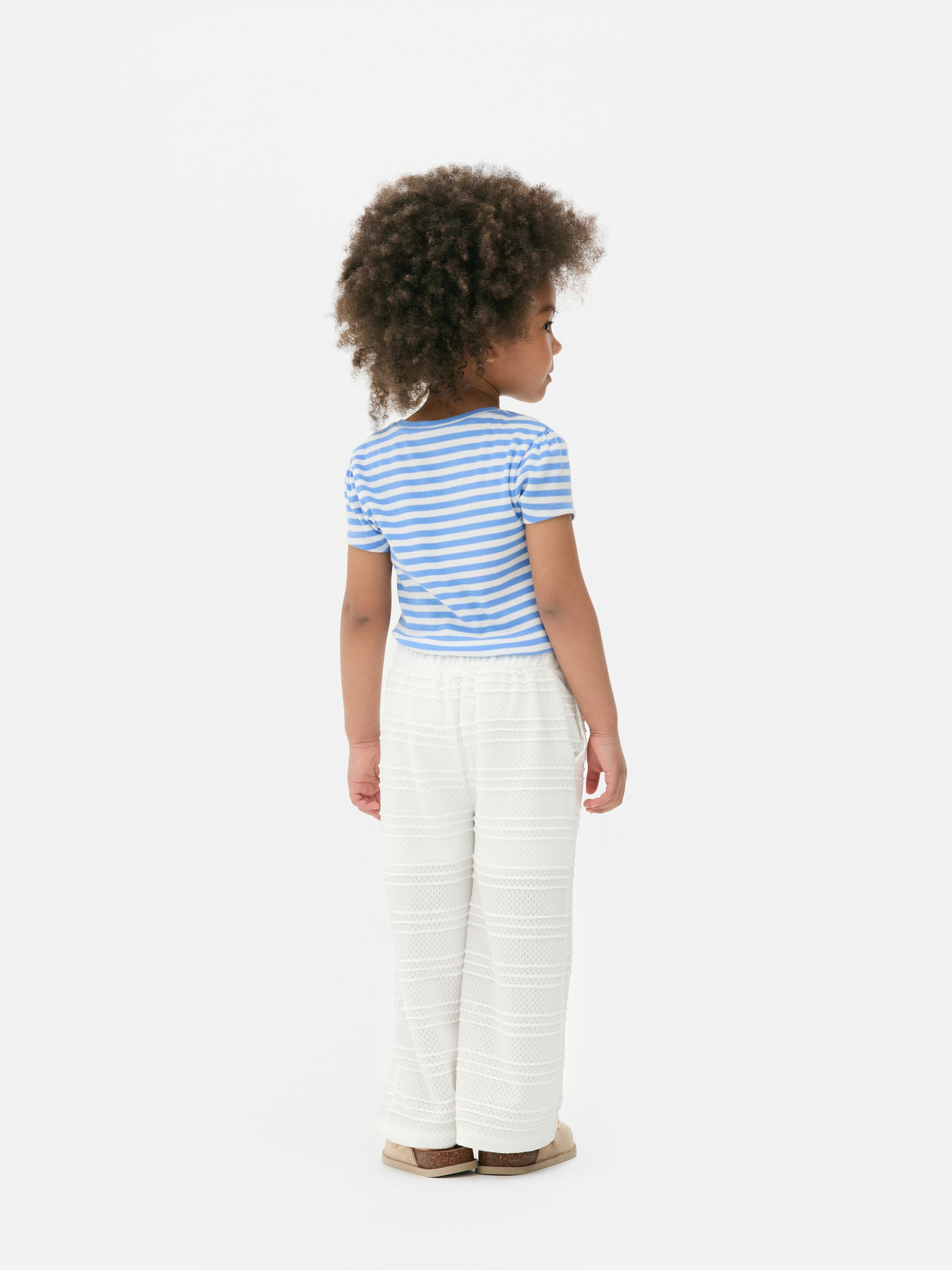 Pantalones con bordado inglés