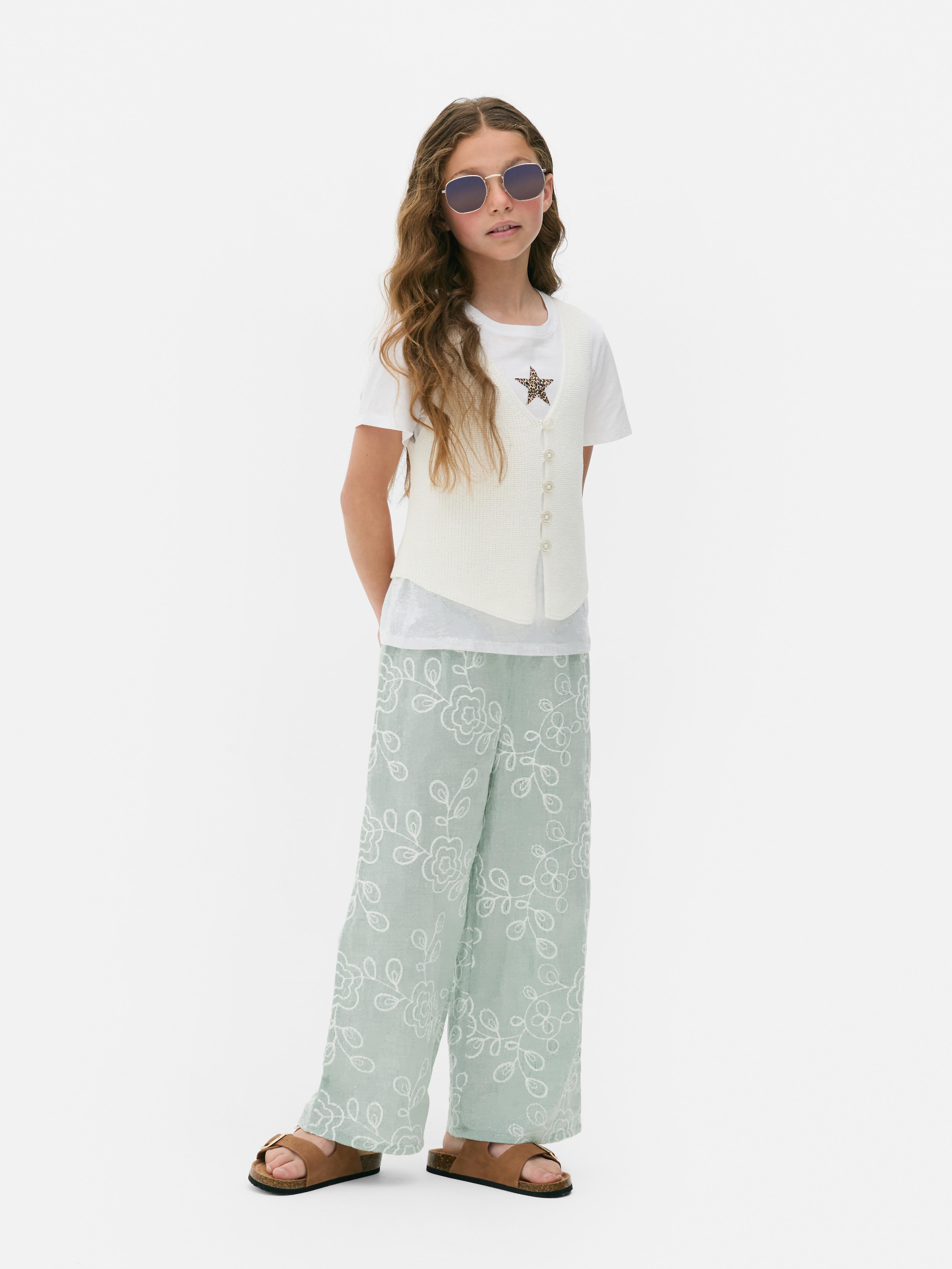 Broek met geborduurde bloemen