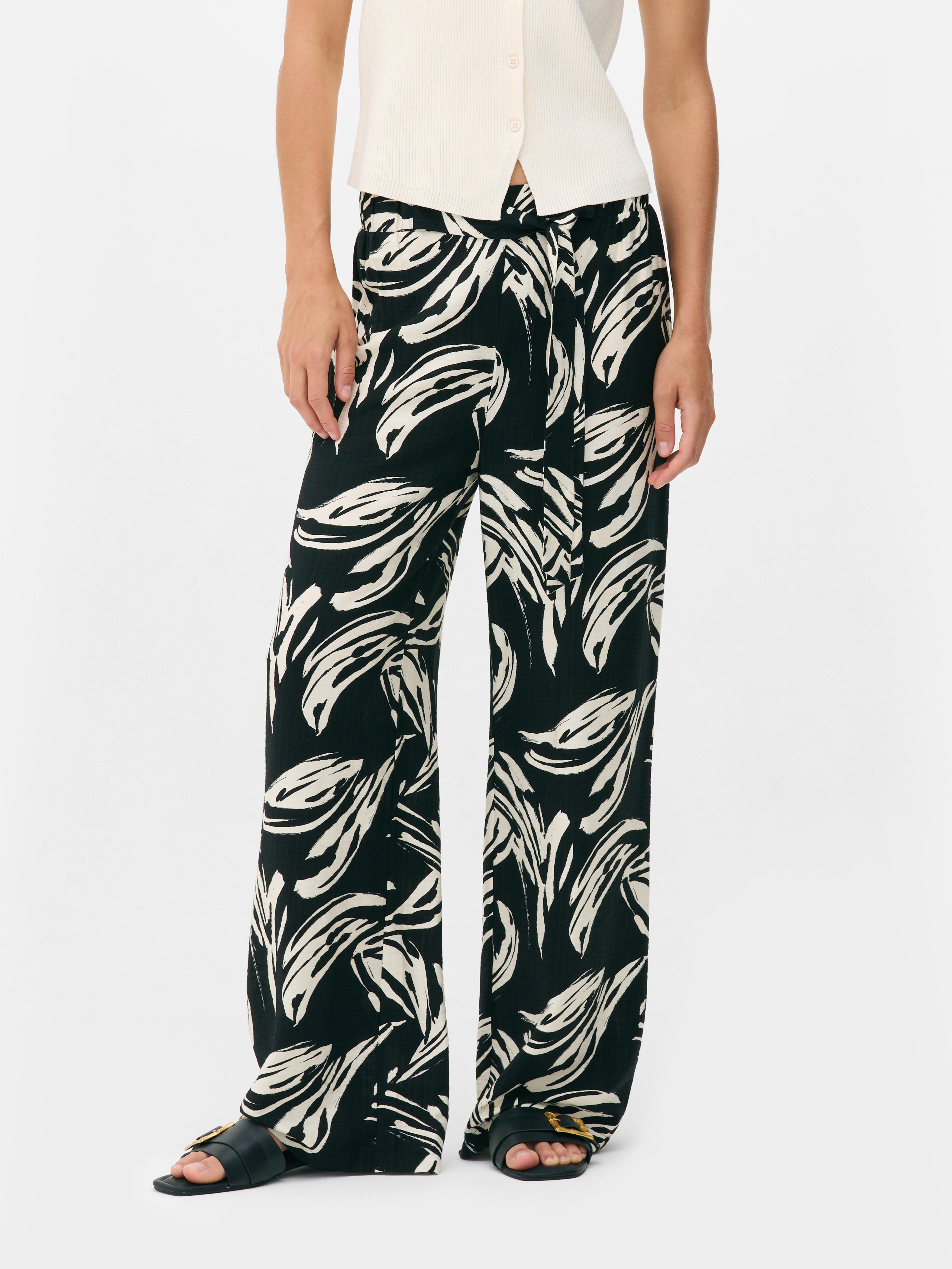 Pantalón palazzo estampado de pernera ancha