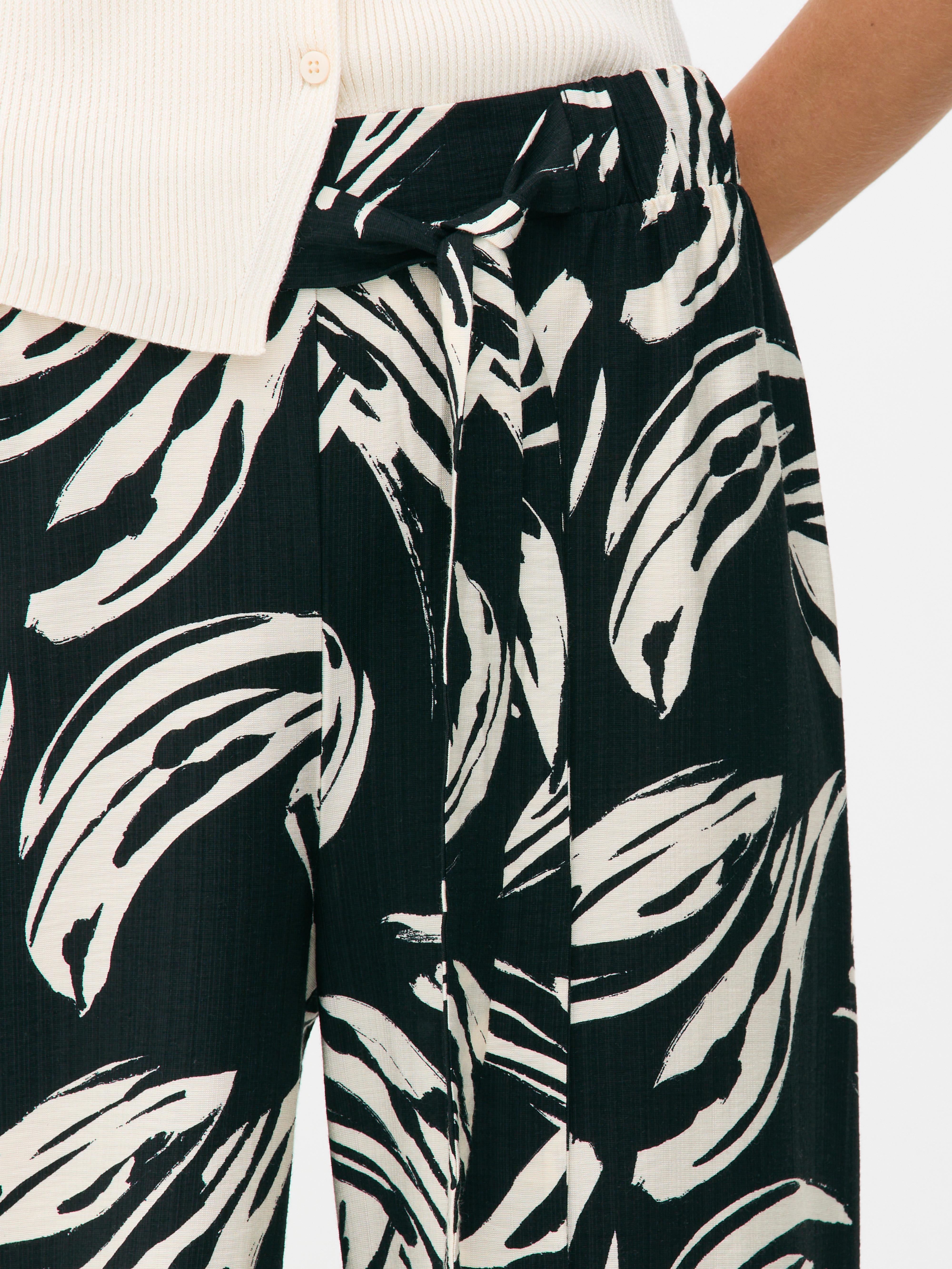 Pantalón palazzo estampado de pernera ancha