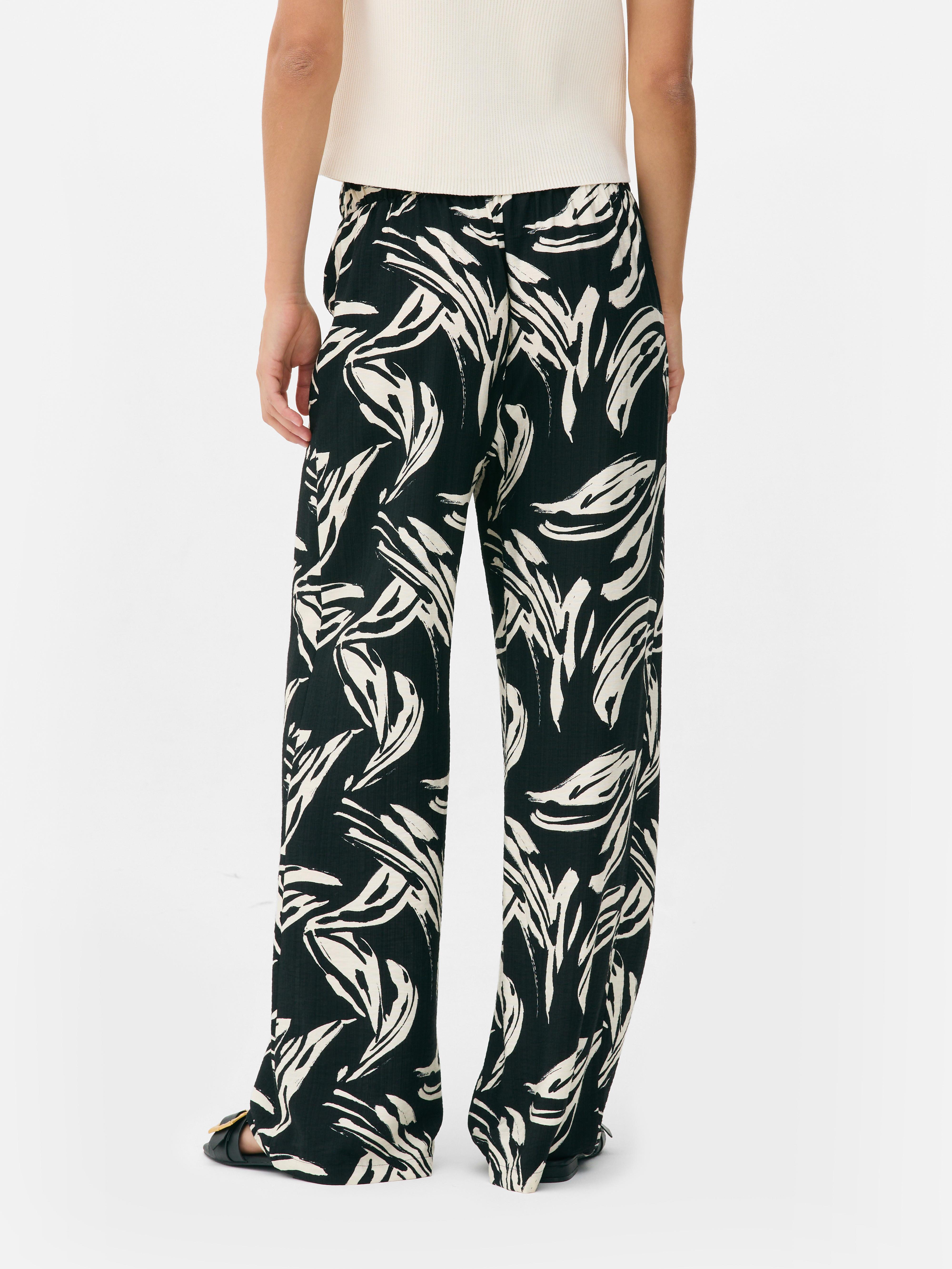 Pantalón palazzo estampado de pernera ancha
