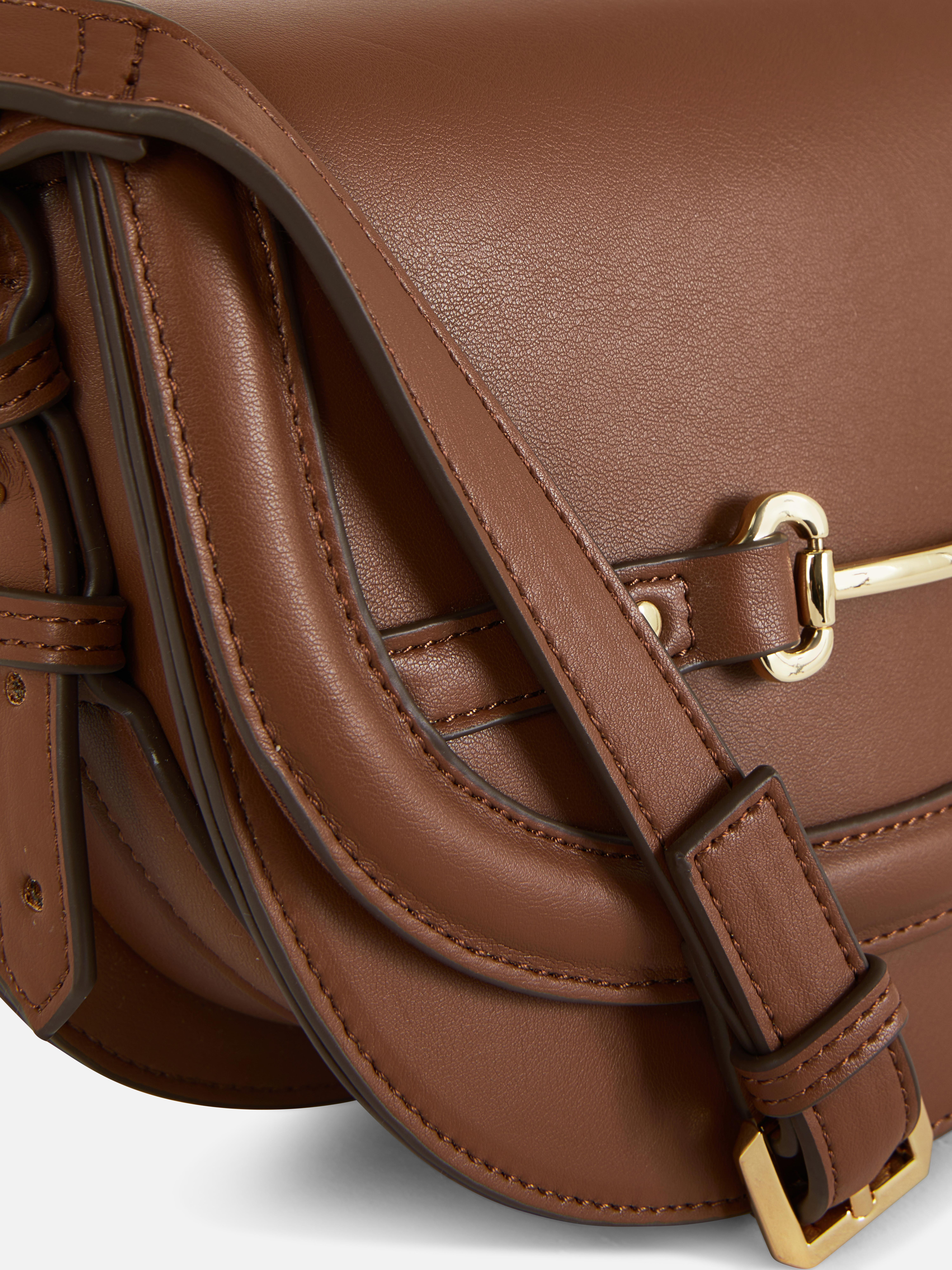 Saddle crossbody-tas met gesp