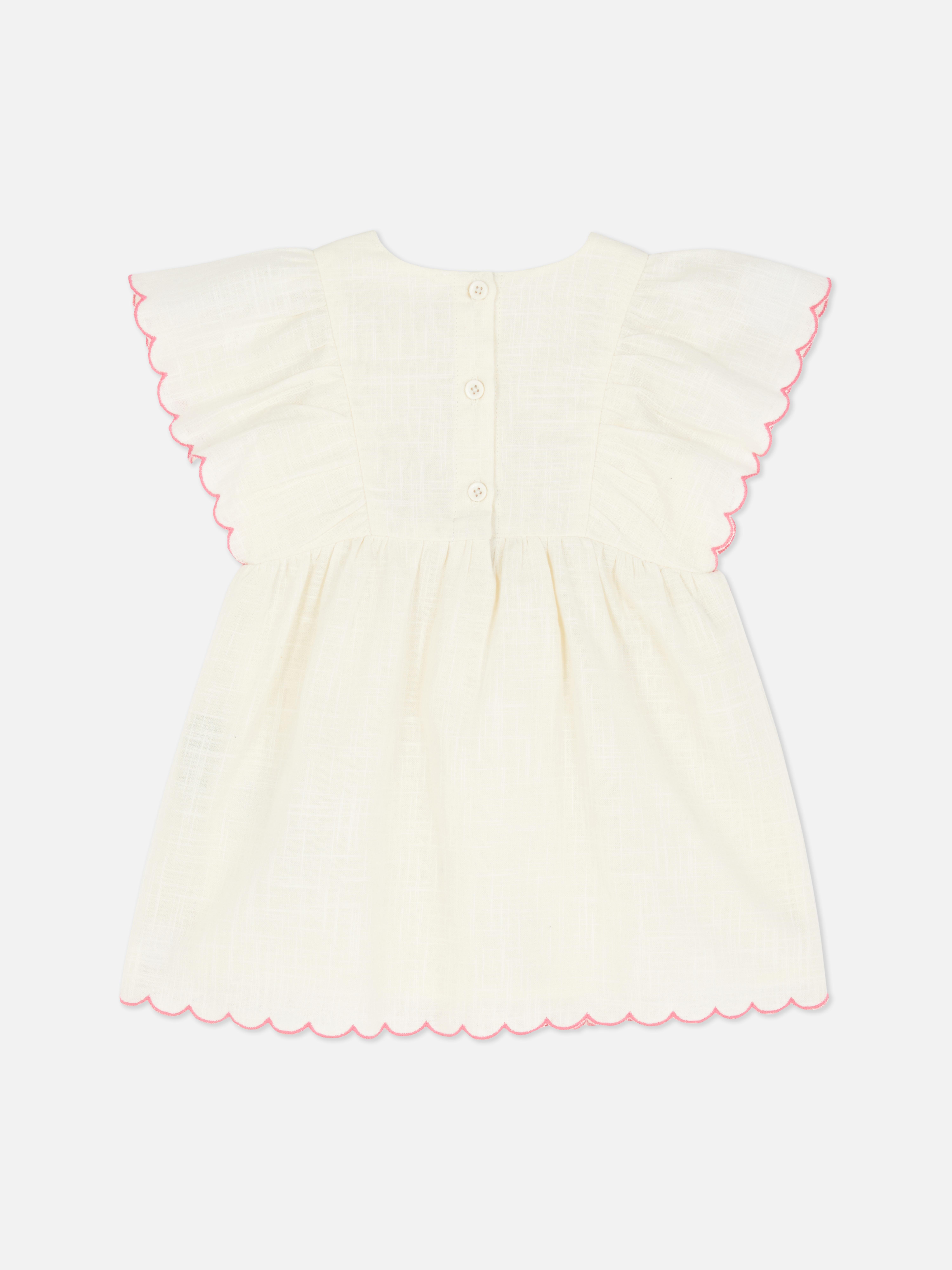 Besticktes Kleid mit Bogenkante