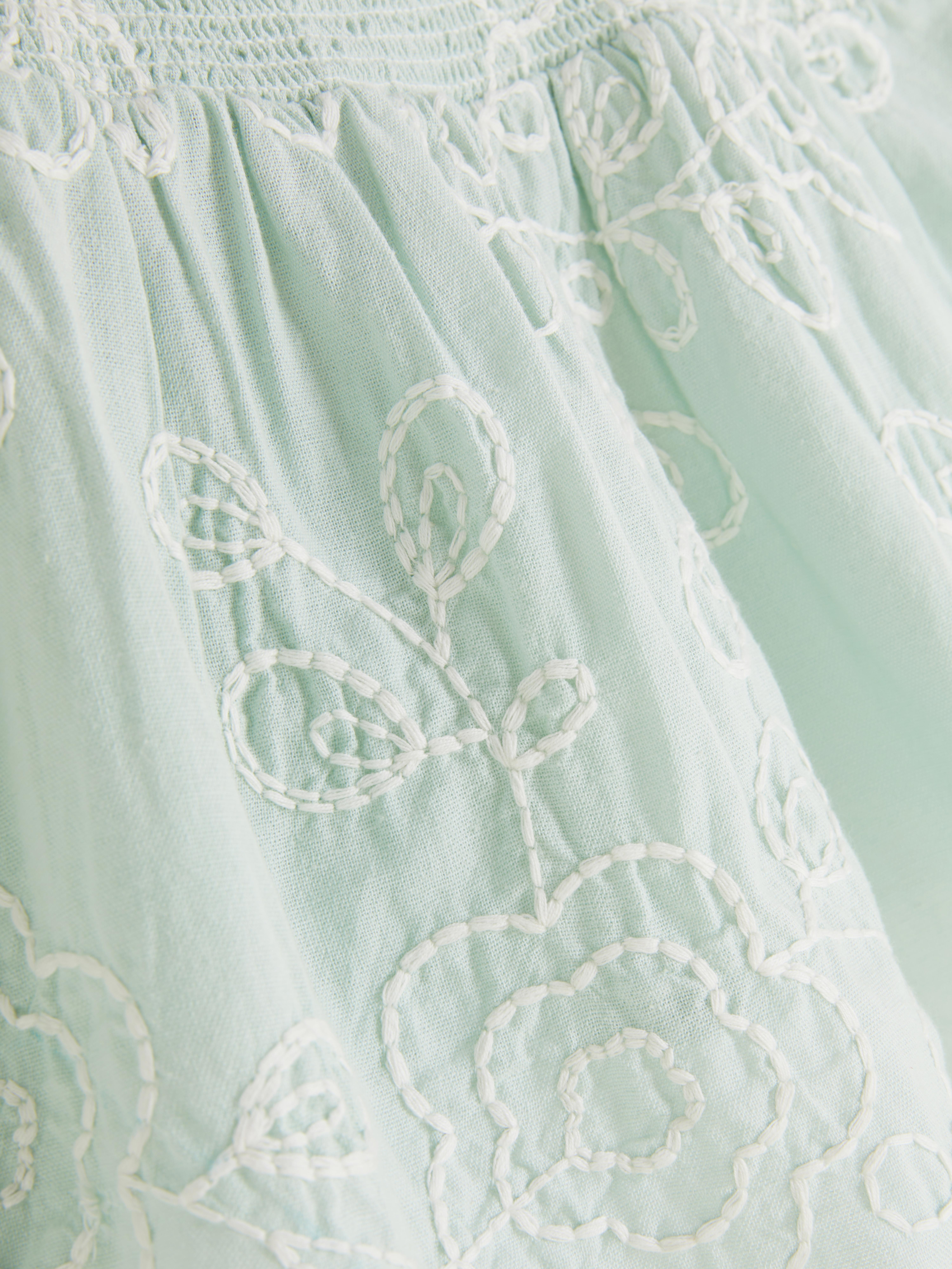 Blouse met geborduurd bloemmotief