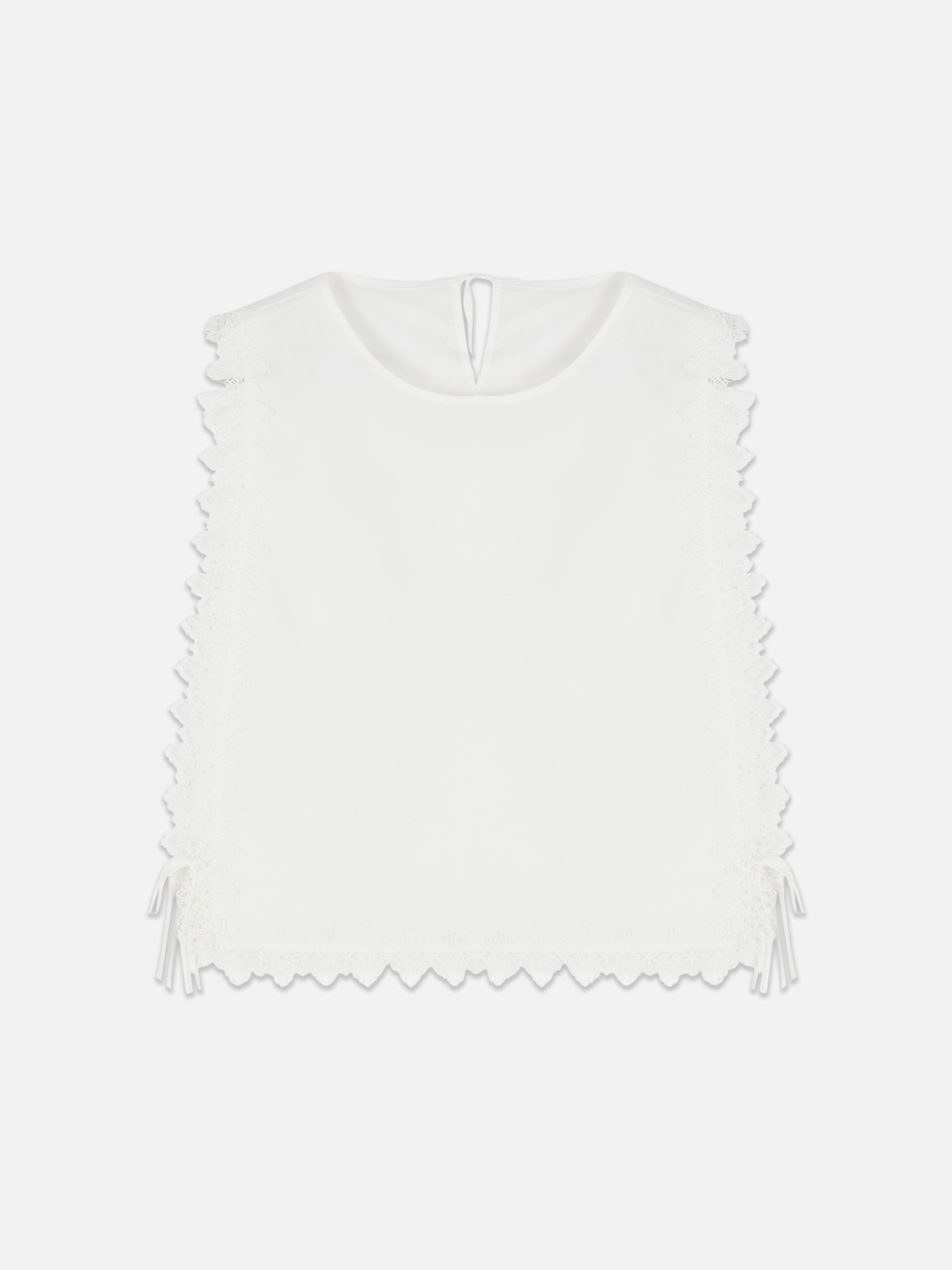 Mouwloze geborduurde top