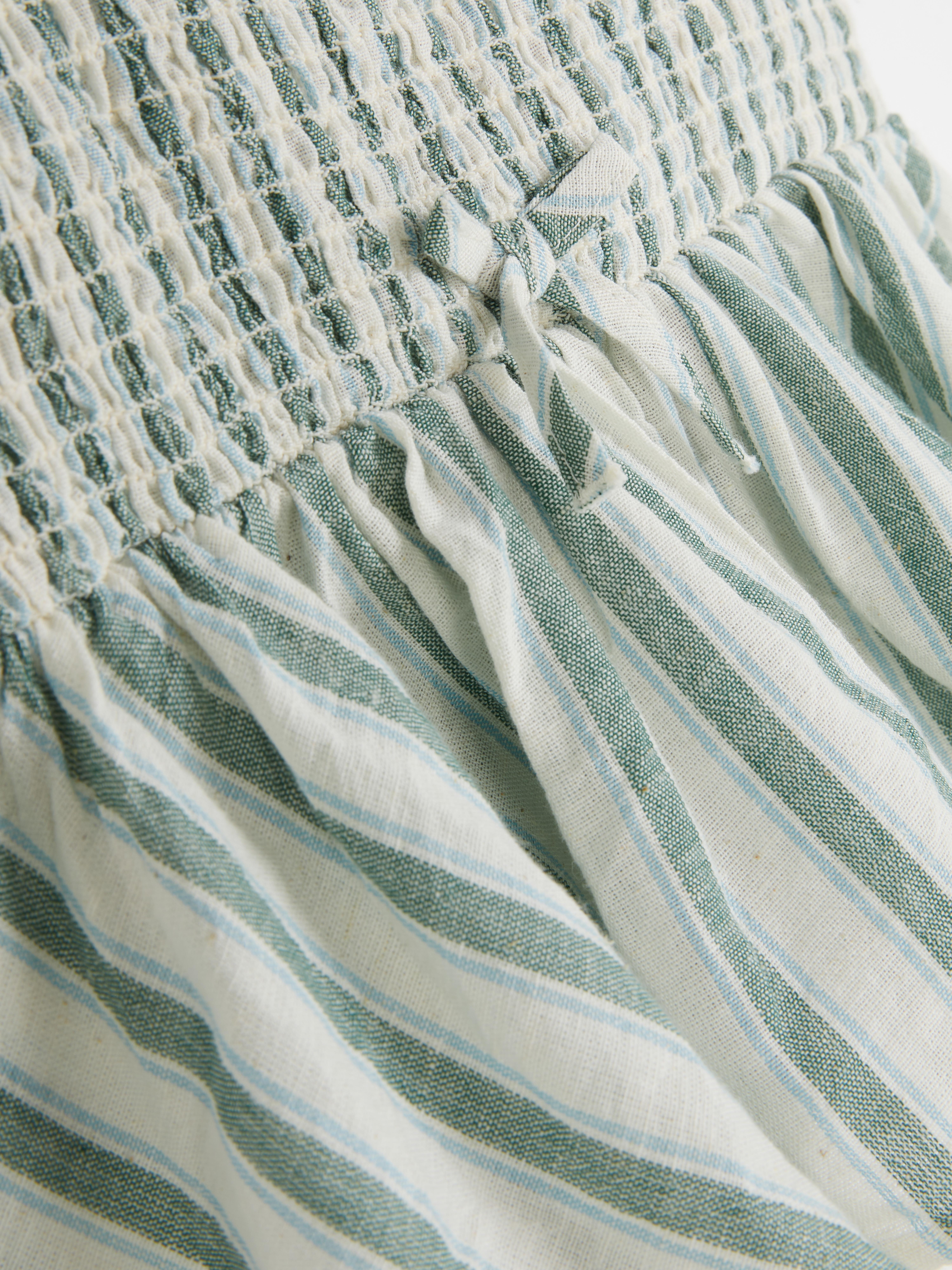 Ärmellose Bluse mit Rüschen und Streifen
