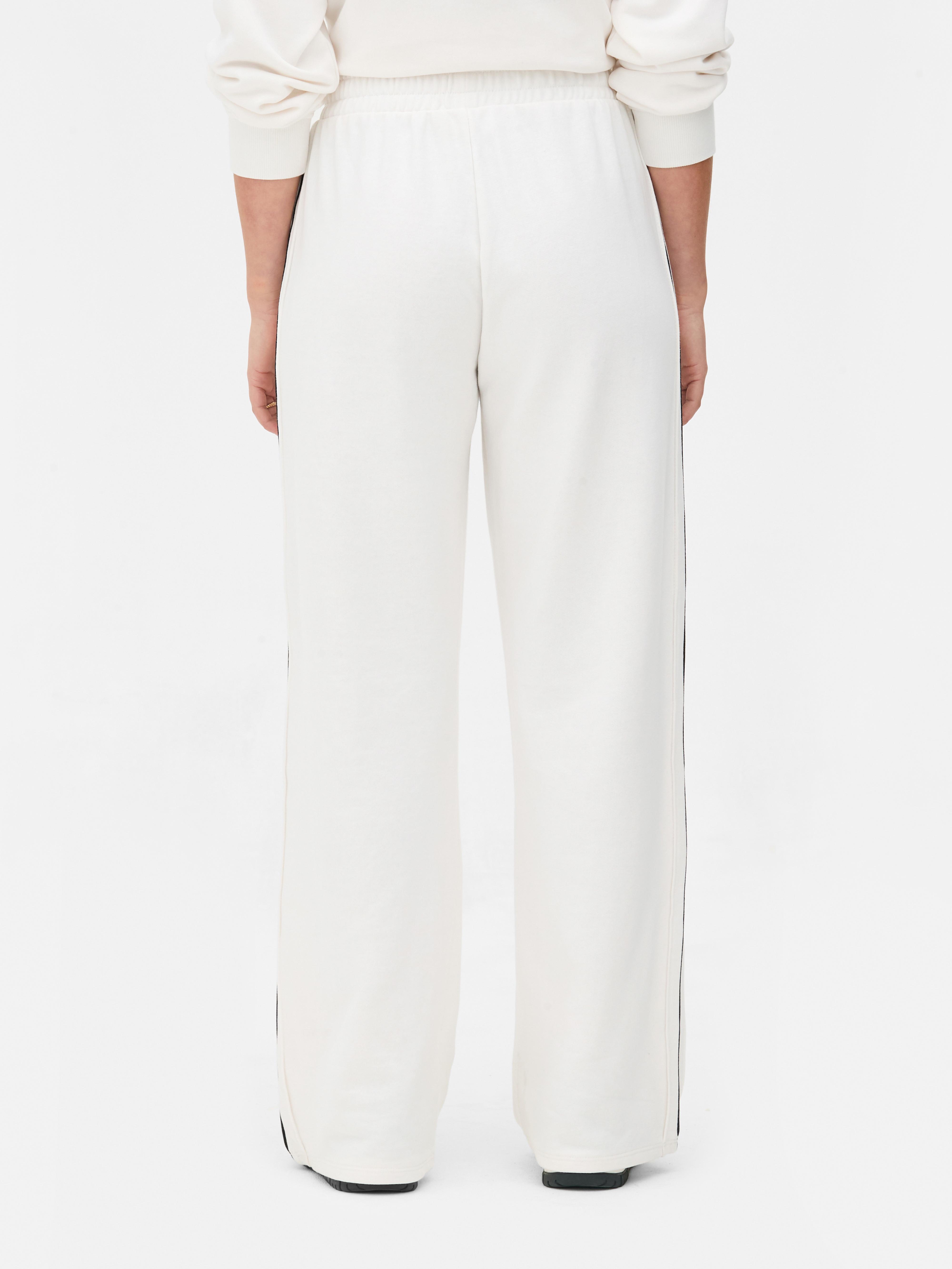 Joggers universitarios de pernera recta combinables