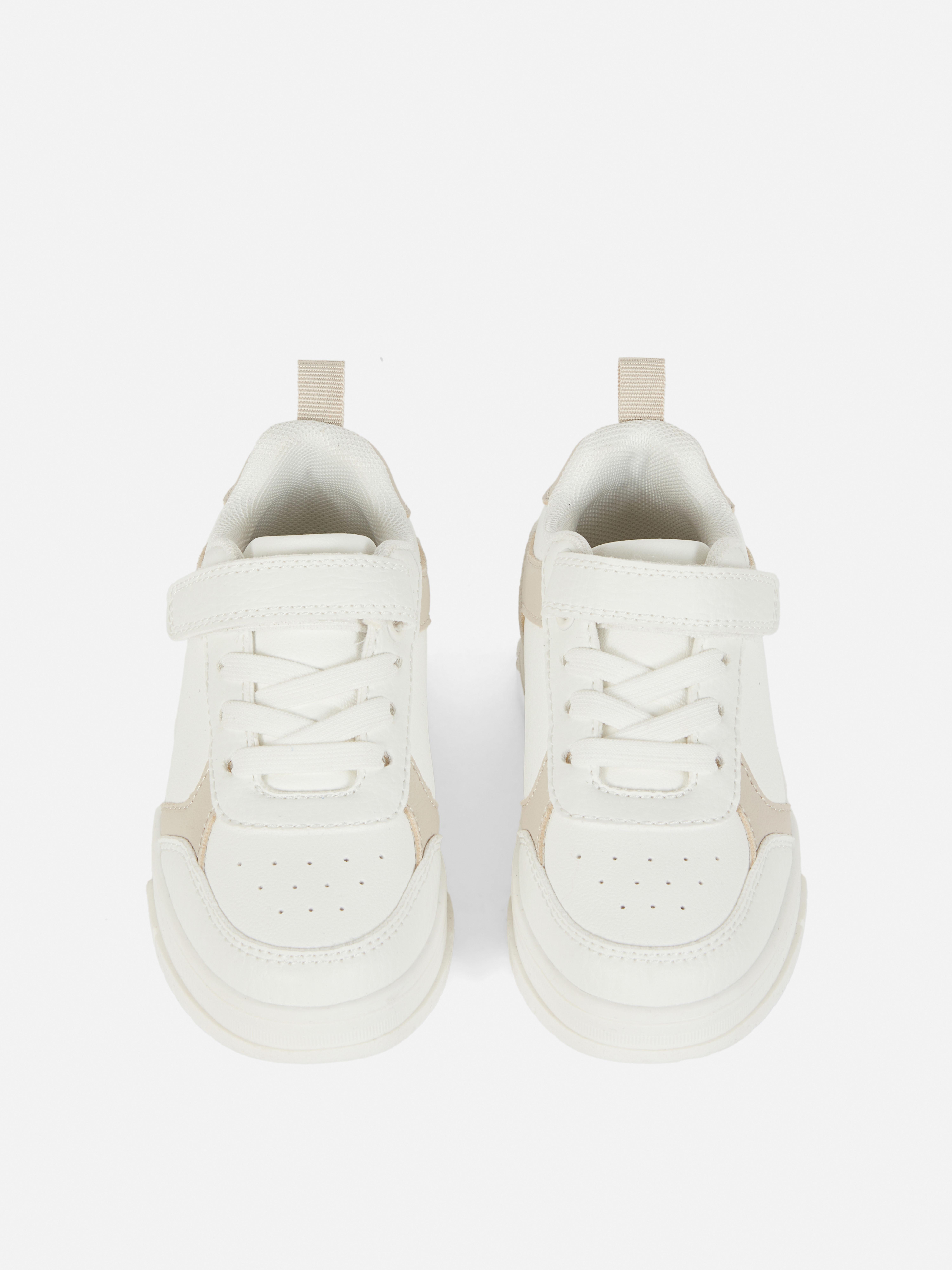 Lage sneakers van imitatieleer en canvas