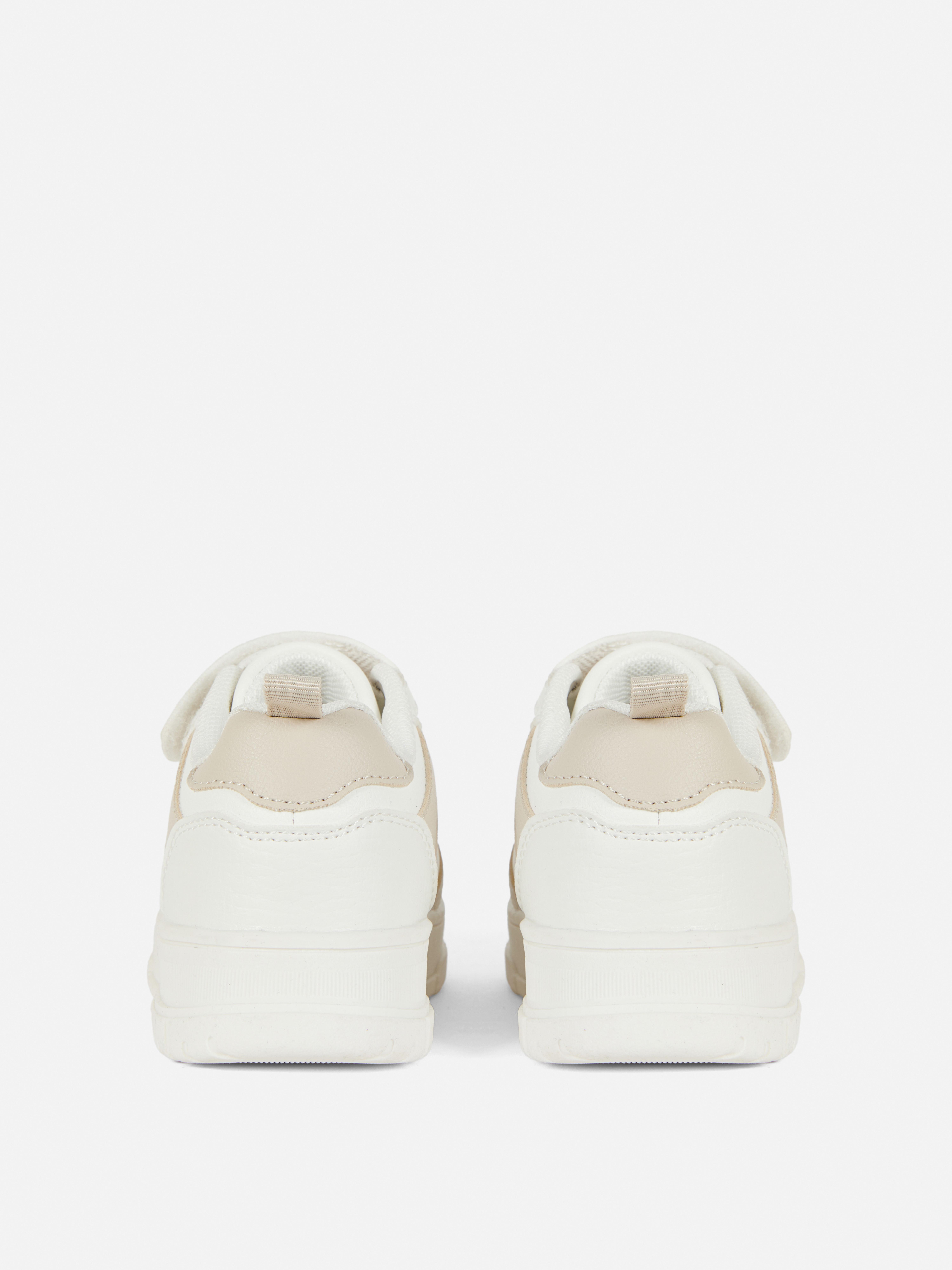 Lage sneakers van imitatieleer en canvas