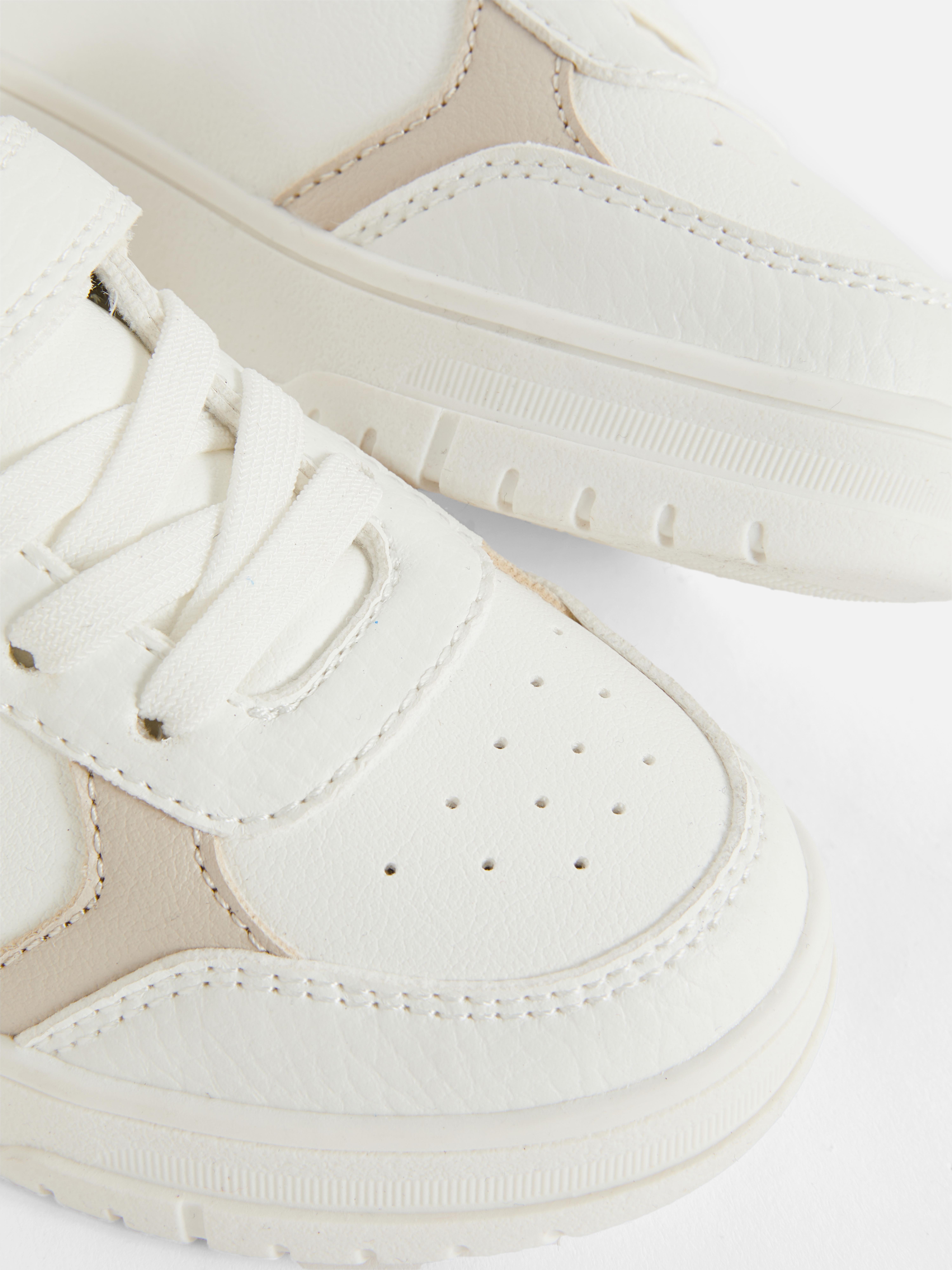 Lage sneakers van imitatieleer en canvas