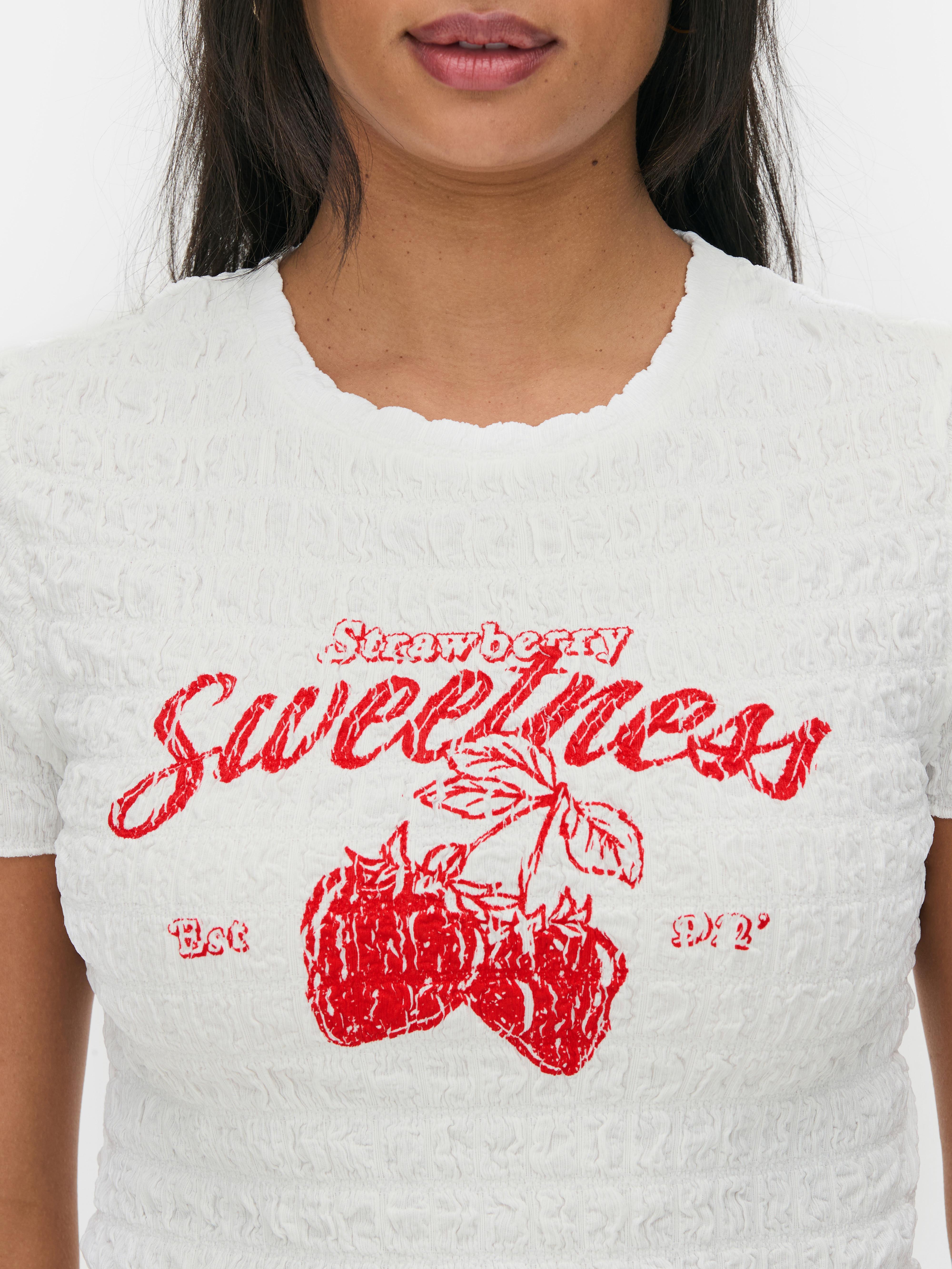 Gesmoktes Baby Tee mit Grafik - Elfenbeinfarben - Damen | Primark