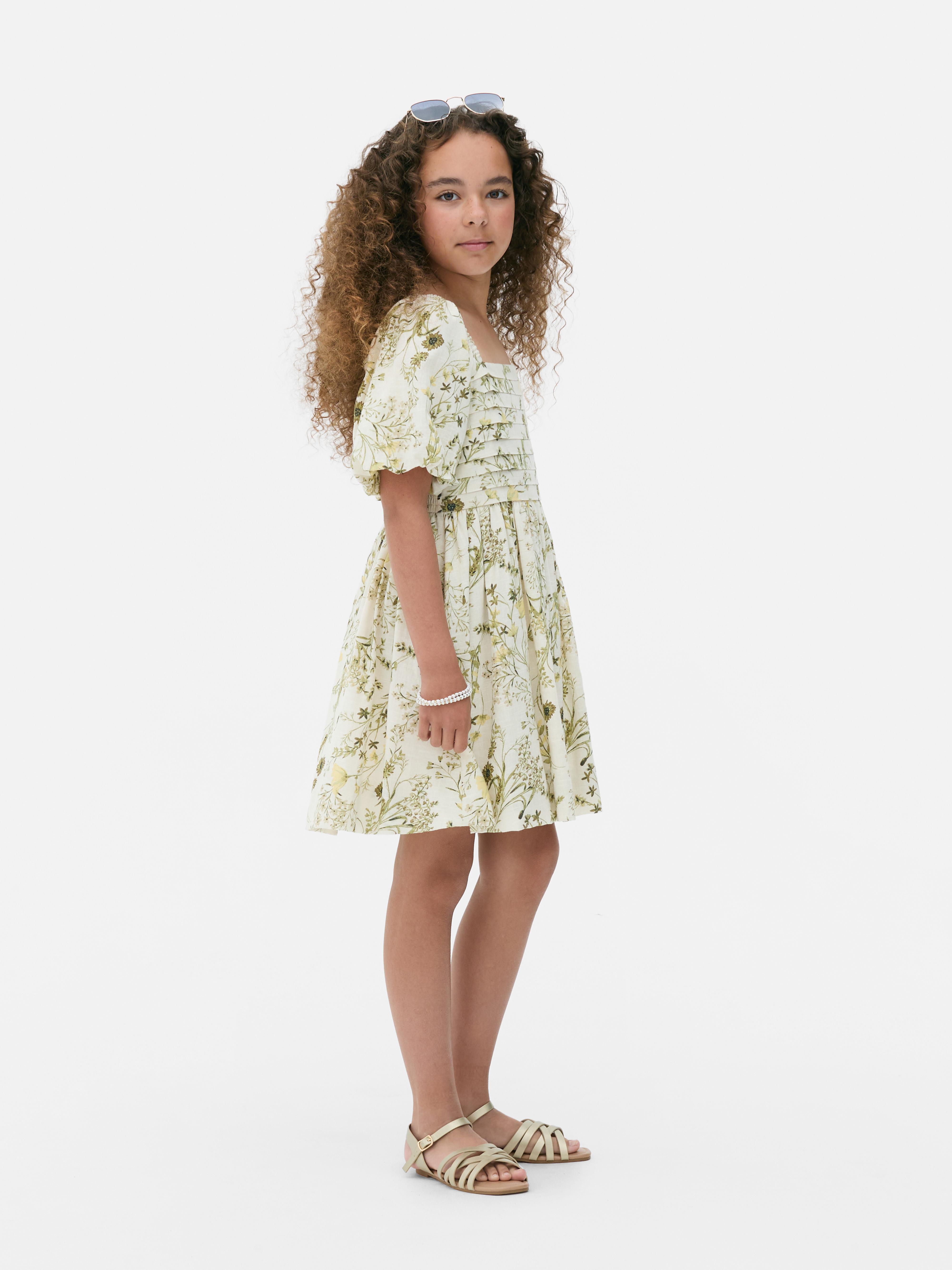 Rochie cu mânecă bufantă și model floral